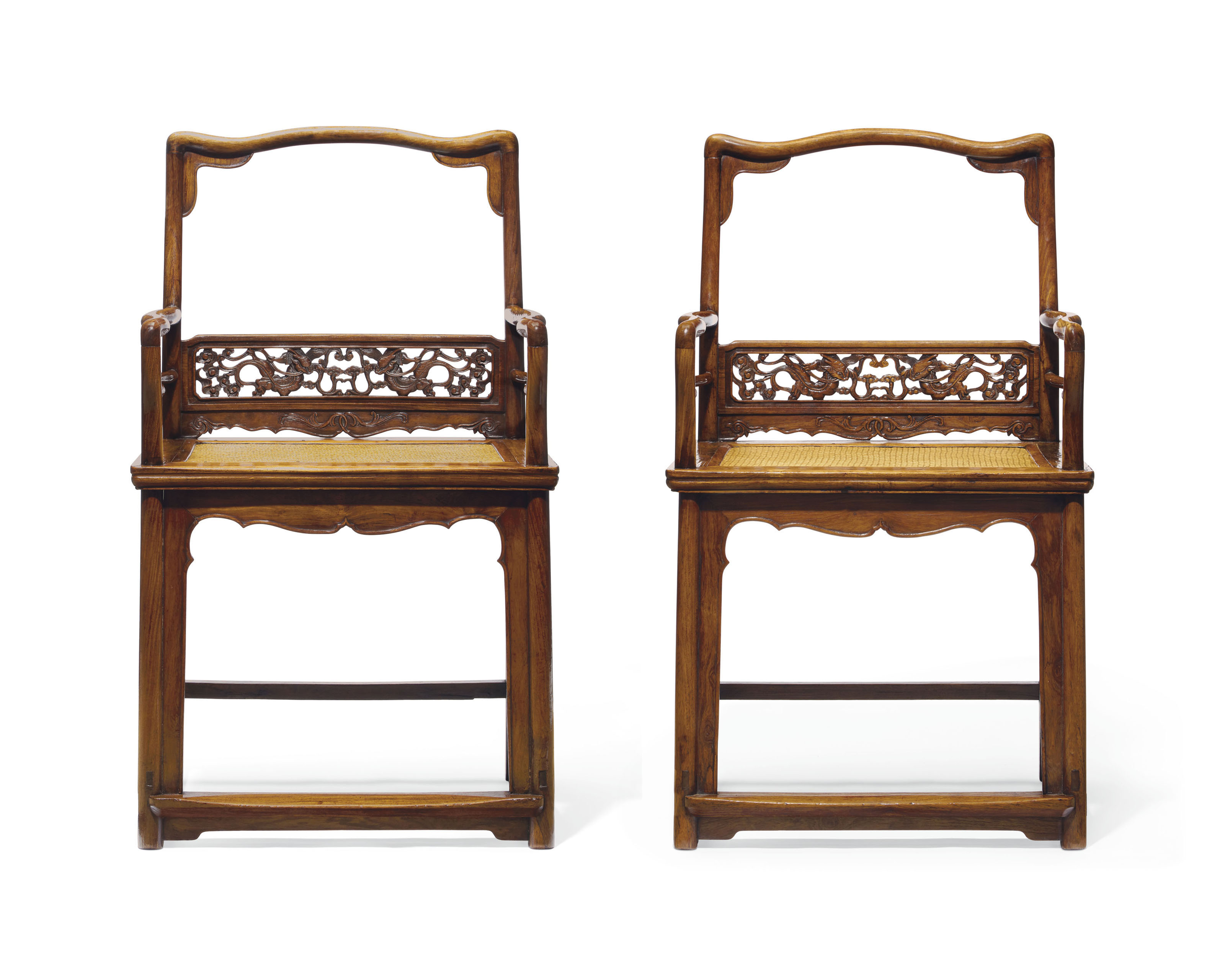A pair of Huanghuali Corner-Leg Stands 87.6 cm. High USD 113,400