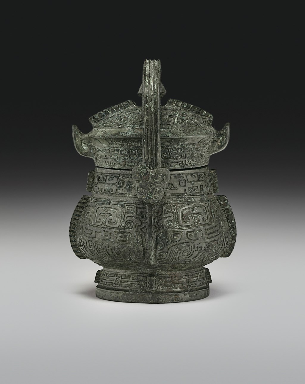 A VERY RARE MINIATURE BRONZE RITUAL WINE VESSEL AND COVER, Y