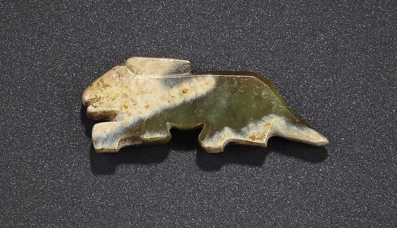 A DARK GREEN JADE RABBIT-FORM PENDANT