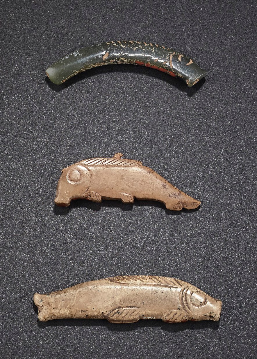 THREE SMALL JADE FISH-FORM PENDANTS