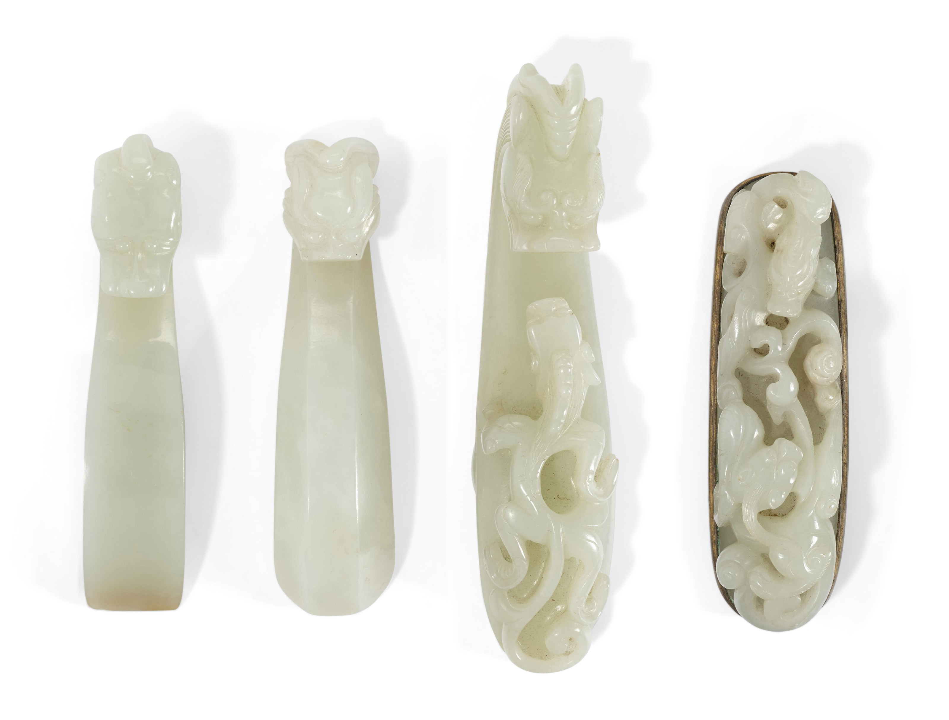 THREE WHITE JADE 'DRAGON' BELT HOOKS, 18TH19TH CENTURY Christie’s