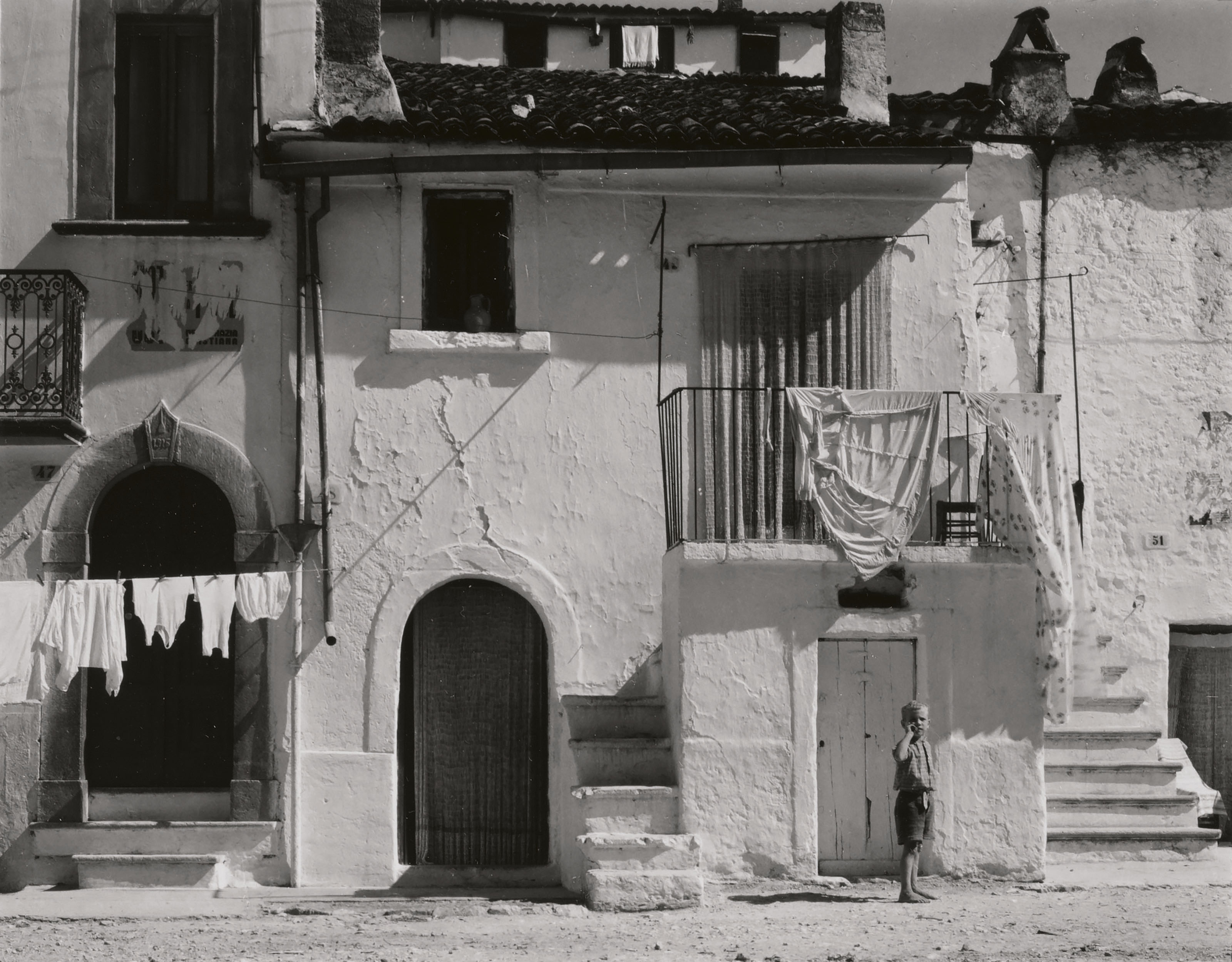 Paul Strand (1890-1976), Town in the Gargano II, Italy, 1952. Mount: 13 x 10&frac14;  in (33 x 25.9  cm). Estimate: $10,000-15,000. This lot is offered in Photographs on 2 April 2019 at Christie&rsquo;s in New York
