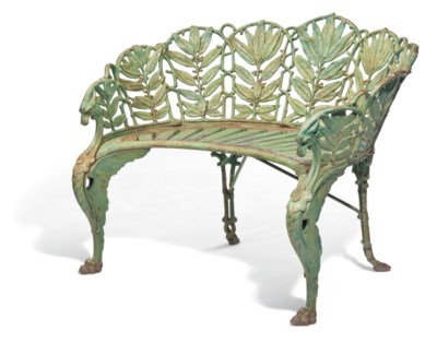 A VICTORIAN CAST-IRON 'LAUREL' PATTERN GARDEN BENCH , BY 