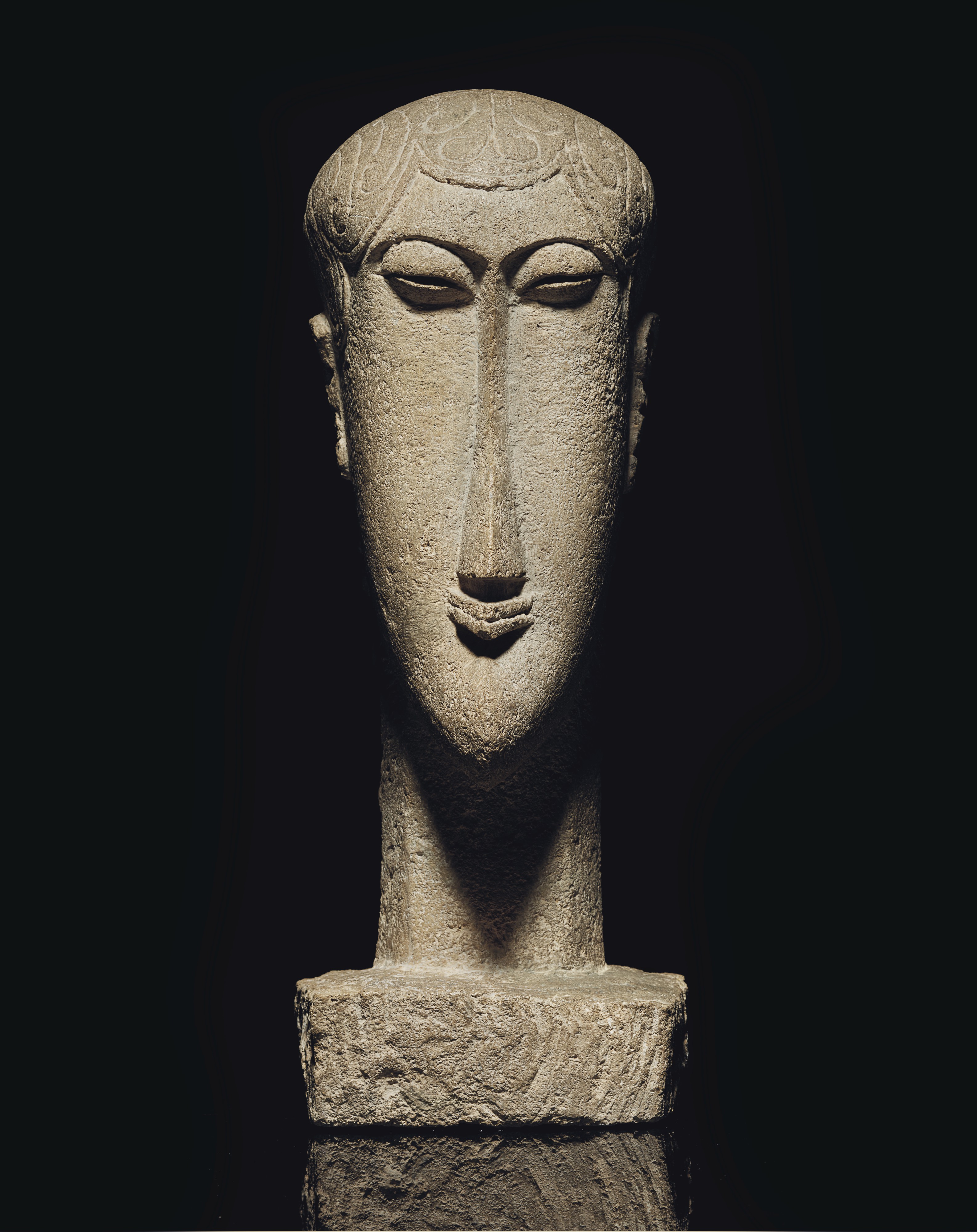 Amedeo Modigliani (1884-1920), T&ecirc;te, carved circa 1911-1912; unique. Height: 20⅛  in (51  cm). Sold for $34,325,000 on 13 May 2019 at Christie&rsquo;s in New York