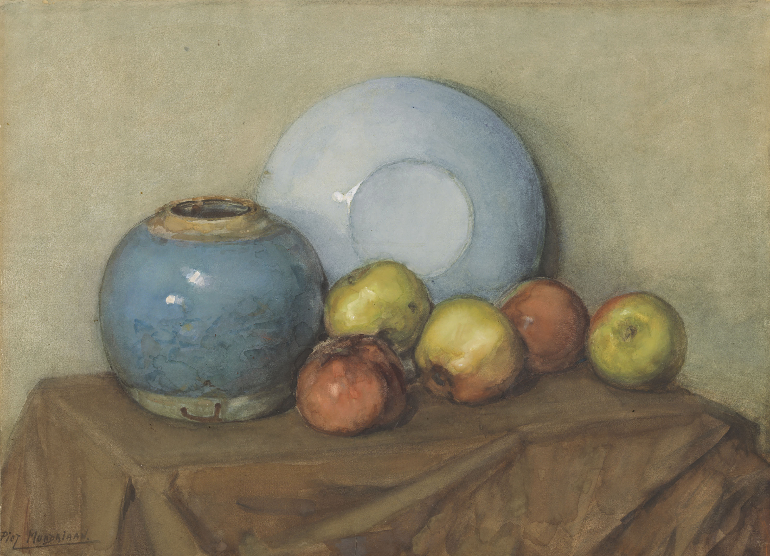 Appels, ronde pot en plaat op een tafel