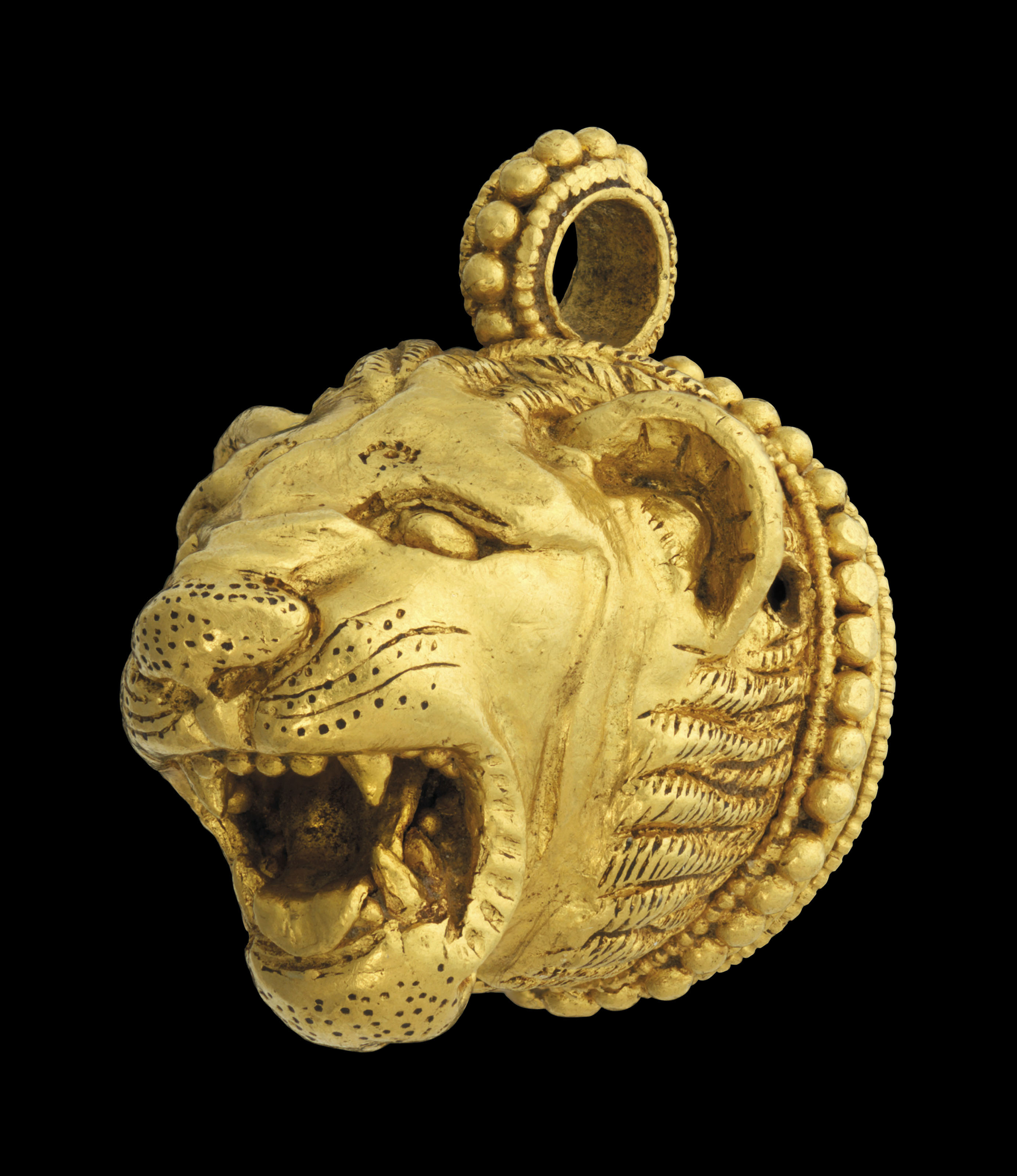A GREEK GOLD LION HEAD PENDANT , CLASSICAL PERIOD, CIRCA 5TH4TH