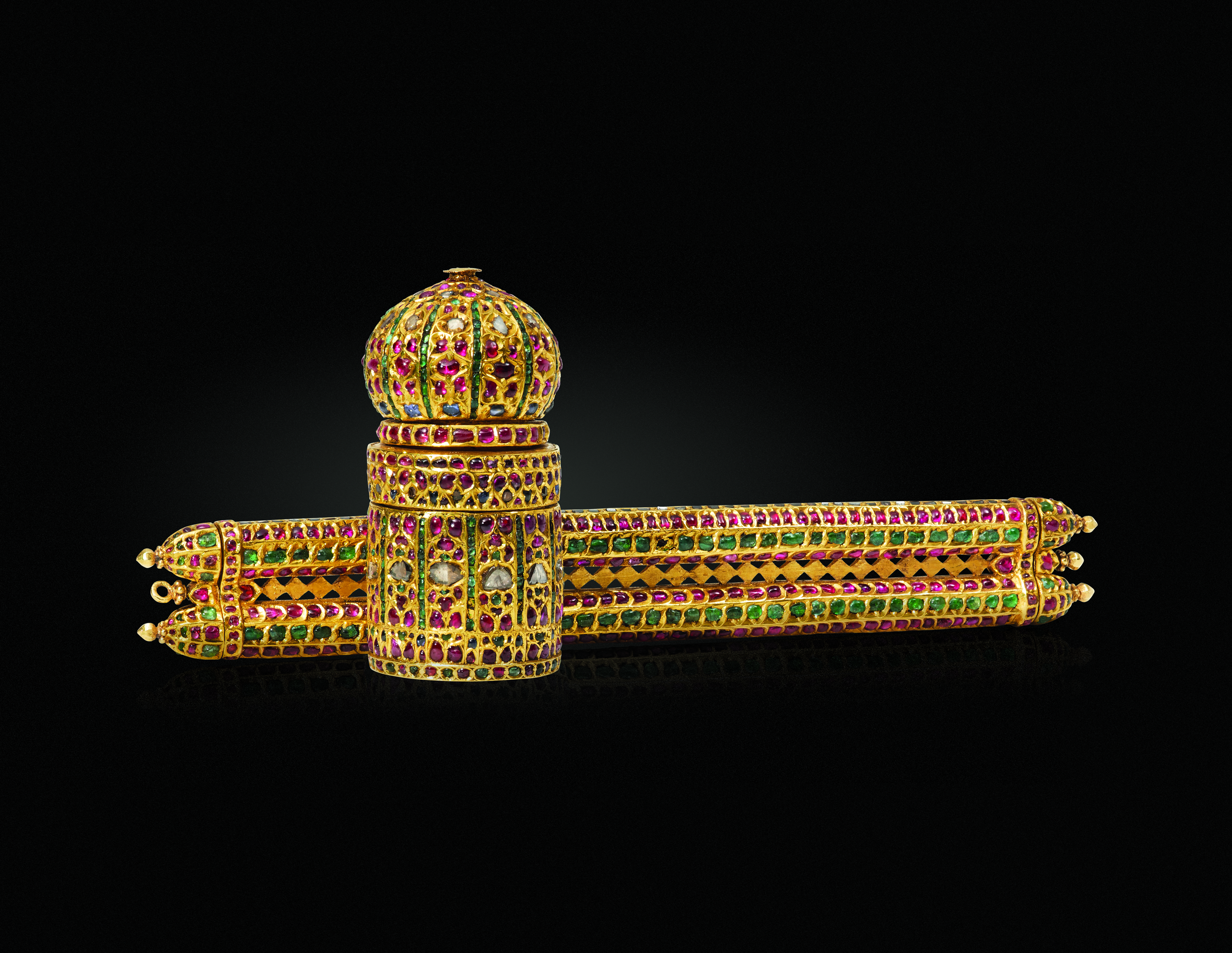 An emerald, ruby and diamond set gold state pen case and inkwell (davat-i dawlat), Deccan, central India, late 16th century, sold for $1,575,000 on 19 June 2019 at Christie's in New York