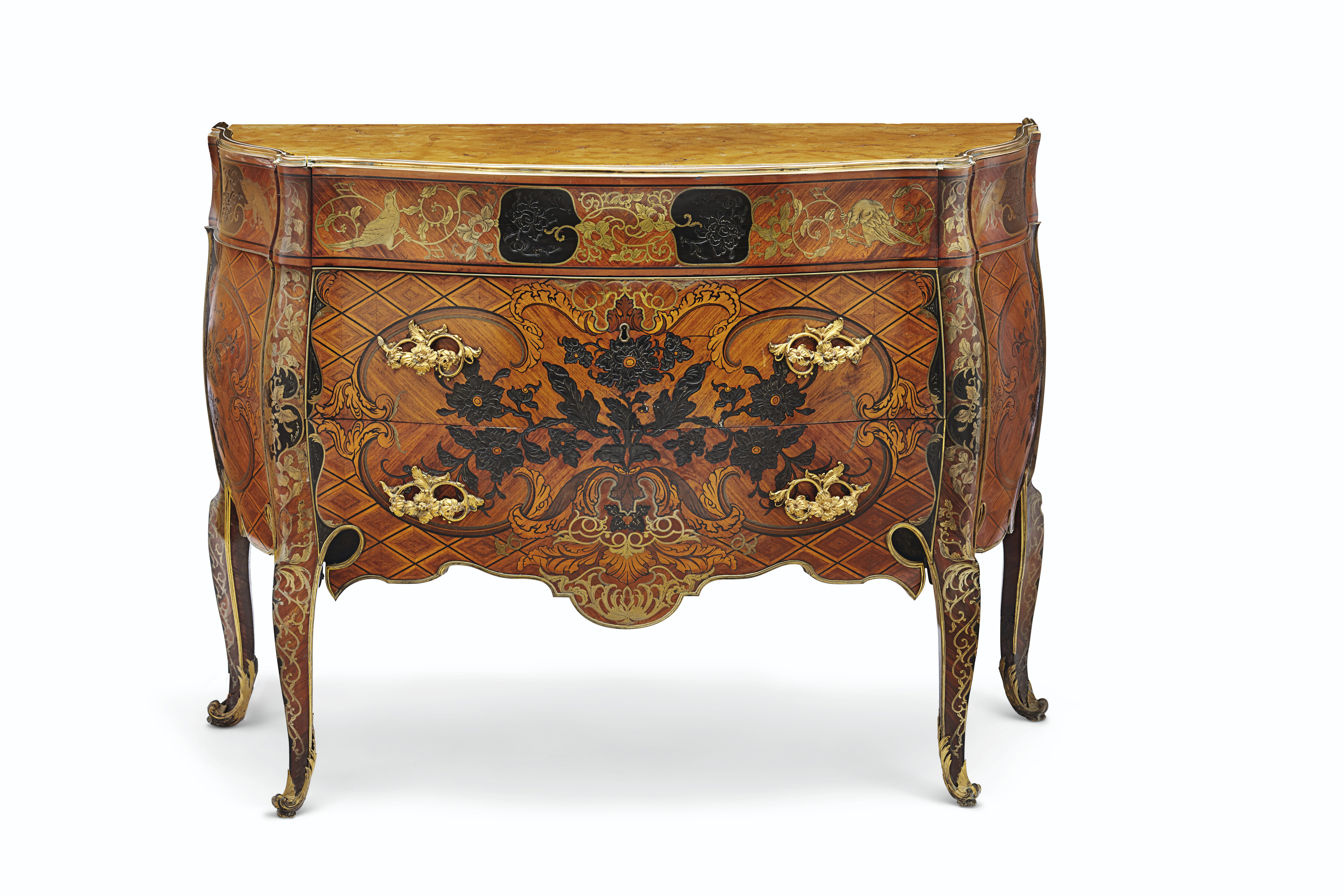 A royal Spanish brass-inlaid and ormolu-mounted tulipwood, ebony, padouk, kingwood and marquetry commode, attributed to Jos&eacute; Canops, after designs by Matteo Gasparini, the bronzes possibly by Juan Bautista Ferroni, circa 1765-75. 37 in (94  cm) high, 52  in (132  cm) wide, 22&frac14;  in (56.5  cm) deep. Sold for $447,000 on 29 October 2019 at Christie&rsquo;s in New York