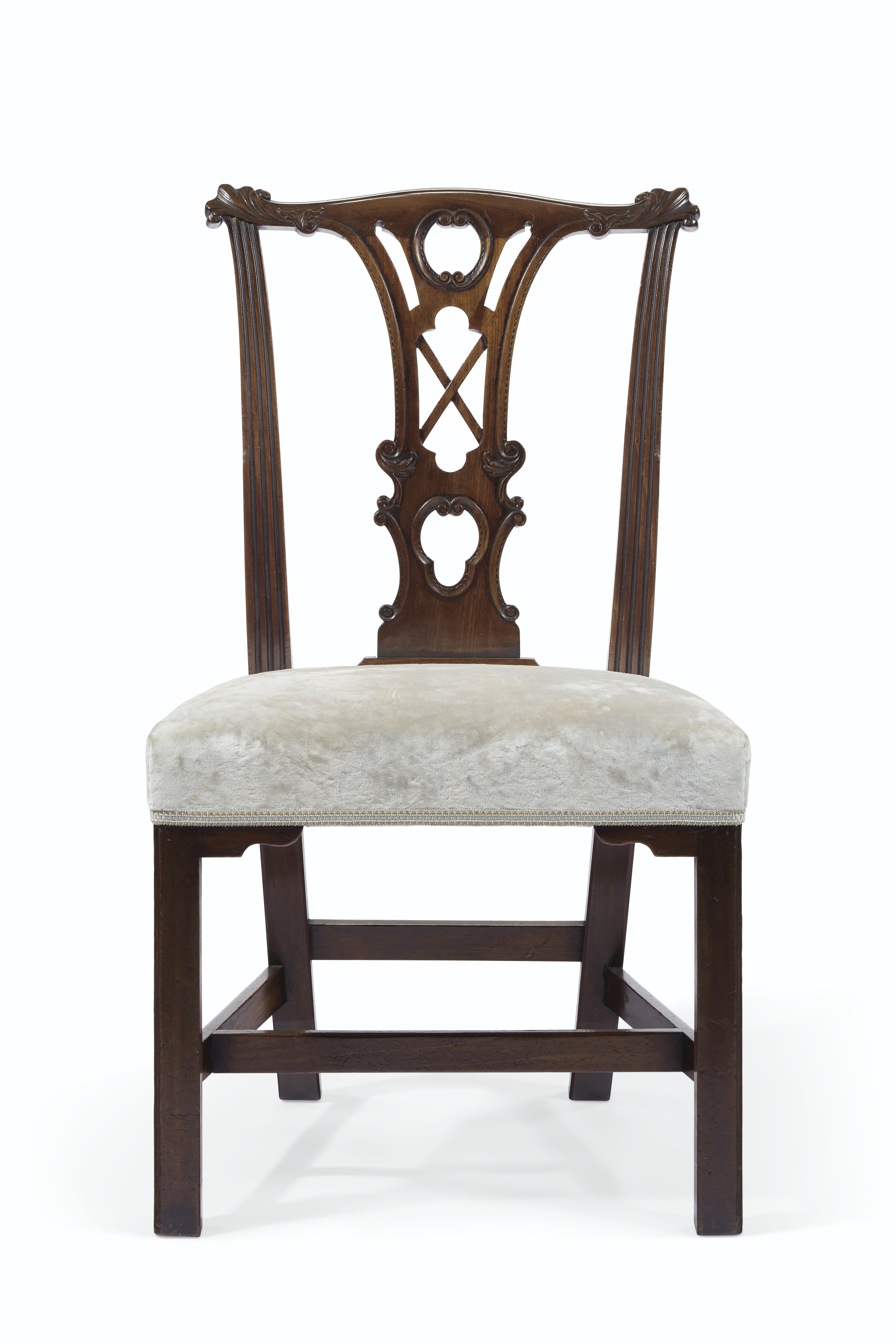 A SET OF TWELVE IRISH III MAHOGANY DINING CHAIRS , CIRCA 1760, WITH TWO ARMCHAIRS OF A