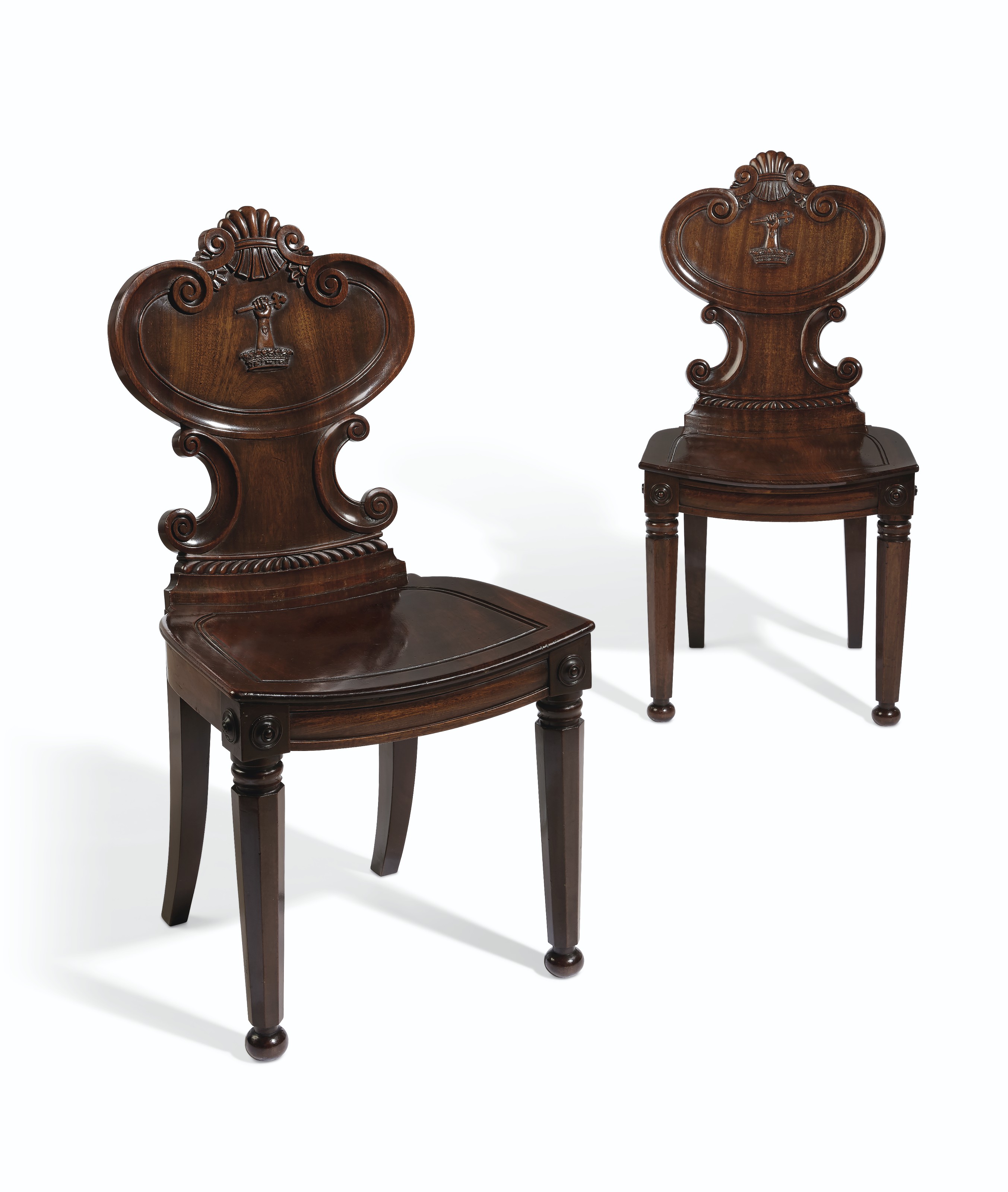 A PAIR OF REGENCY MAHOGANY HALL CHAIRS , CIRCA 1815 Christie's