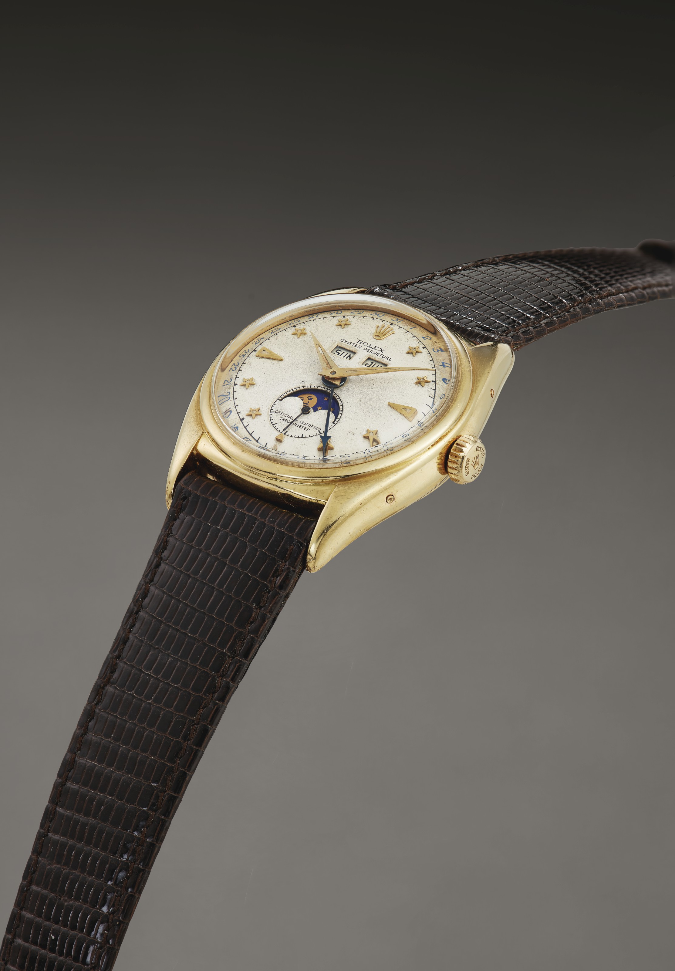 Rolex. An Extremely Fine and Very Early 18k Gold Automatic Triple