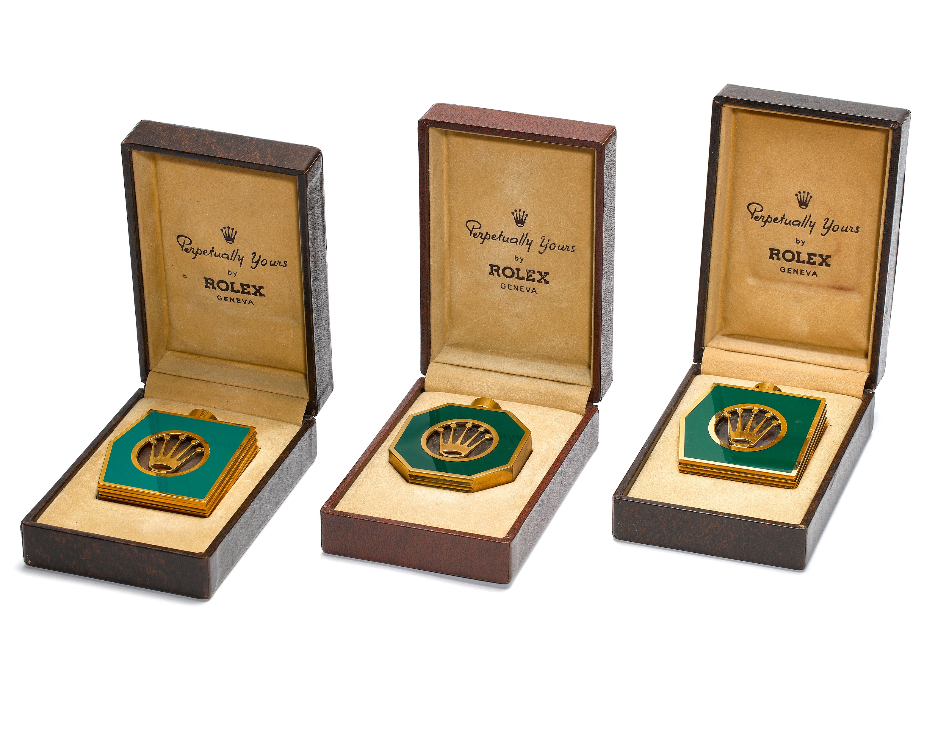 ROLEX, A SET OF THREE VERY RARE GREEN LACQUERED AND GILT PERFUMES