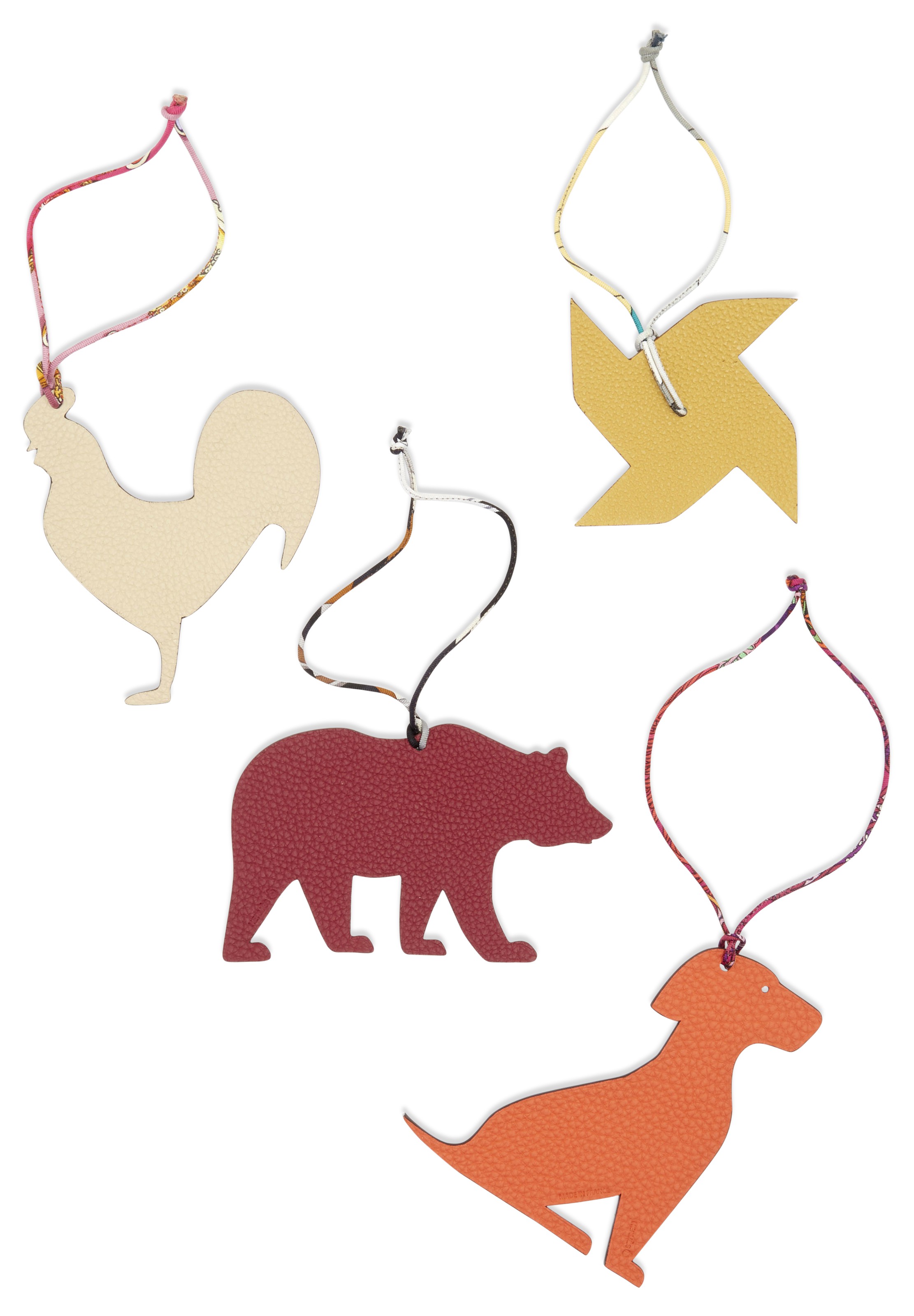 A SET OF FOUR PETIT H CHARMS WINDMILL BEAR ROOSTER DOG