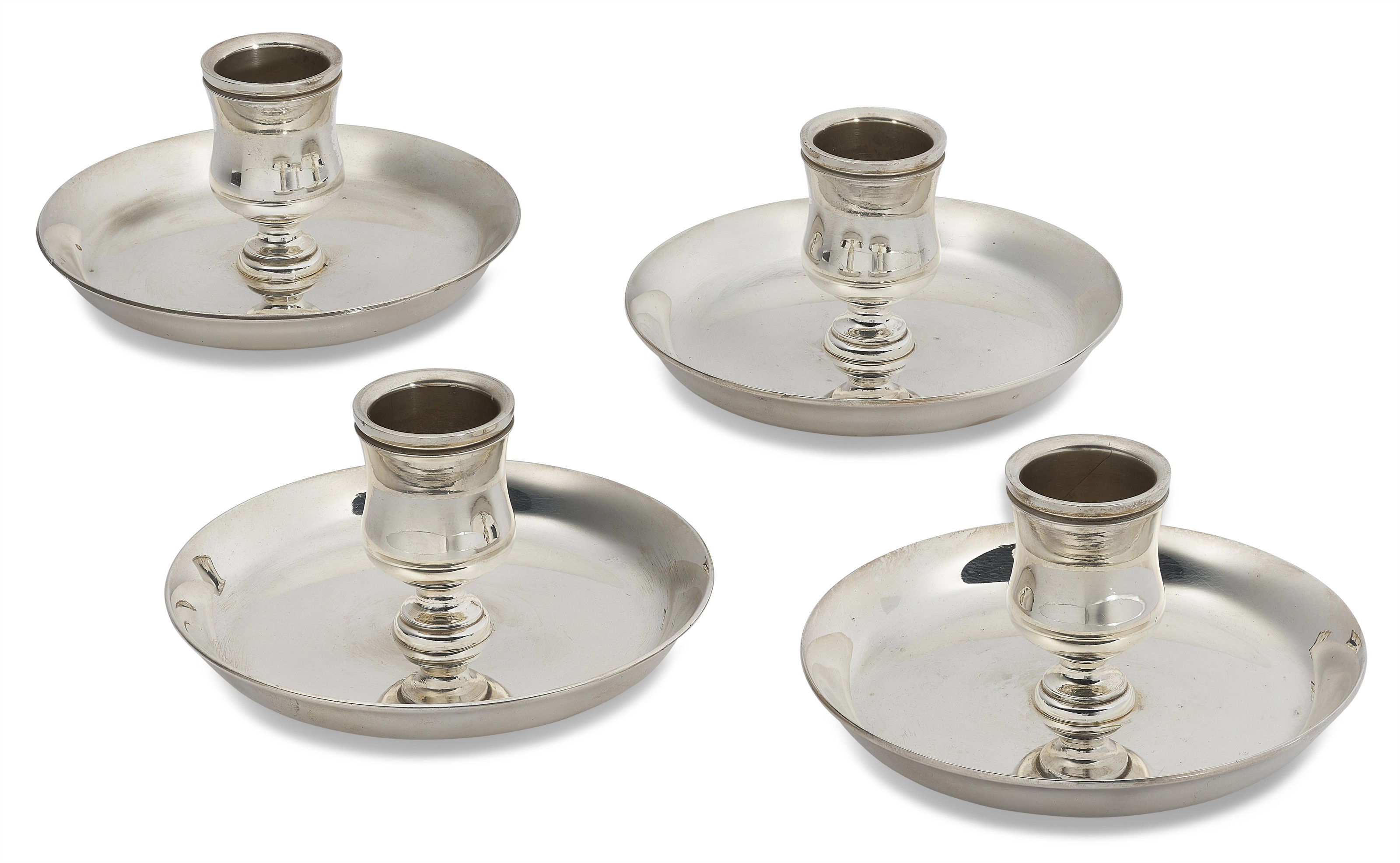 A SET OF FOUR: SILVER CANDLESTICK HOLDERS, HERMÈS, 1980s | Christie's