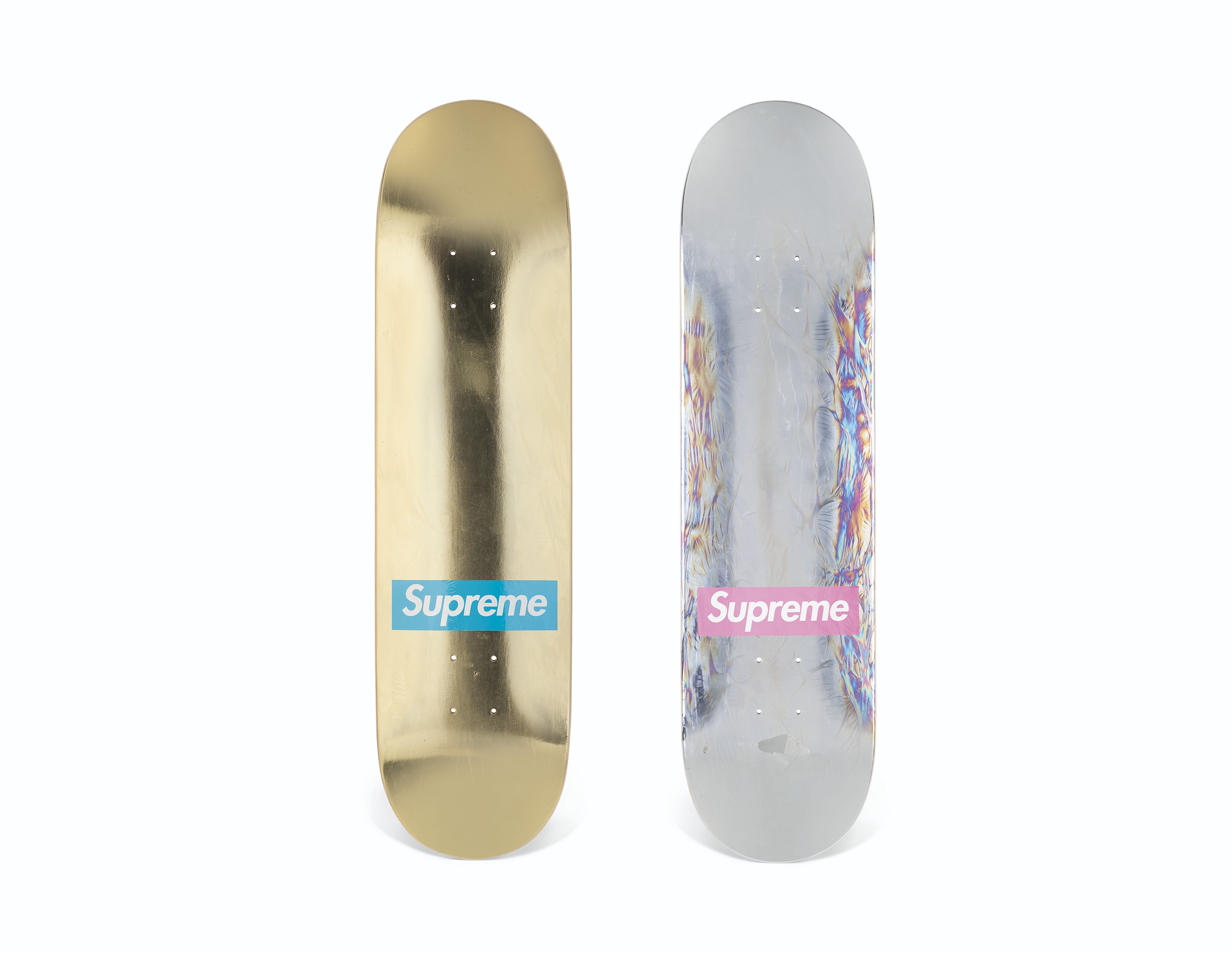 A SET OF TWO GOLD & SILVER FOIL SKATEBOARDS, SUPREME, 2009 | Christie's