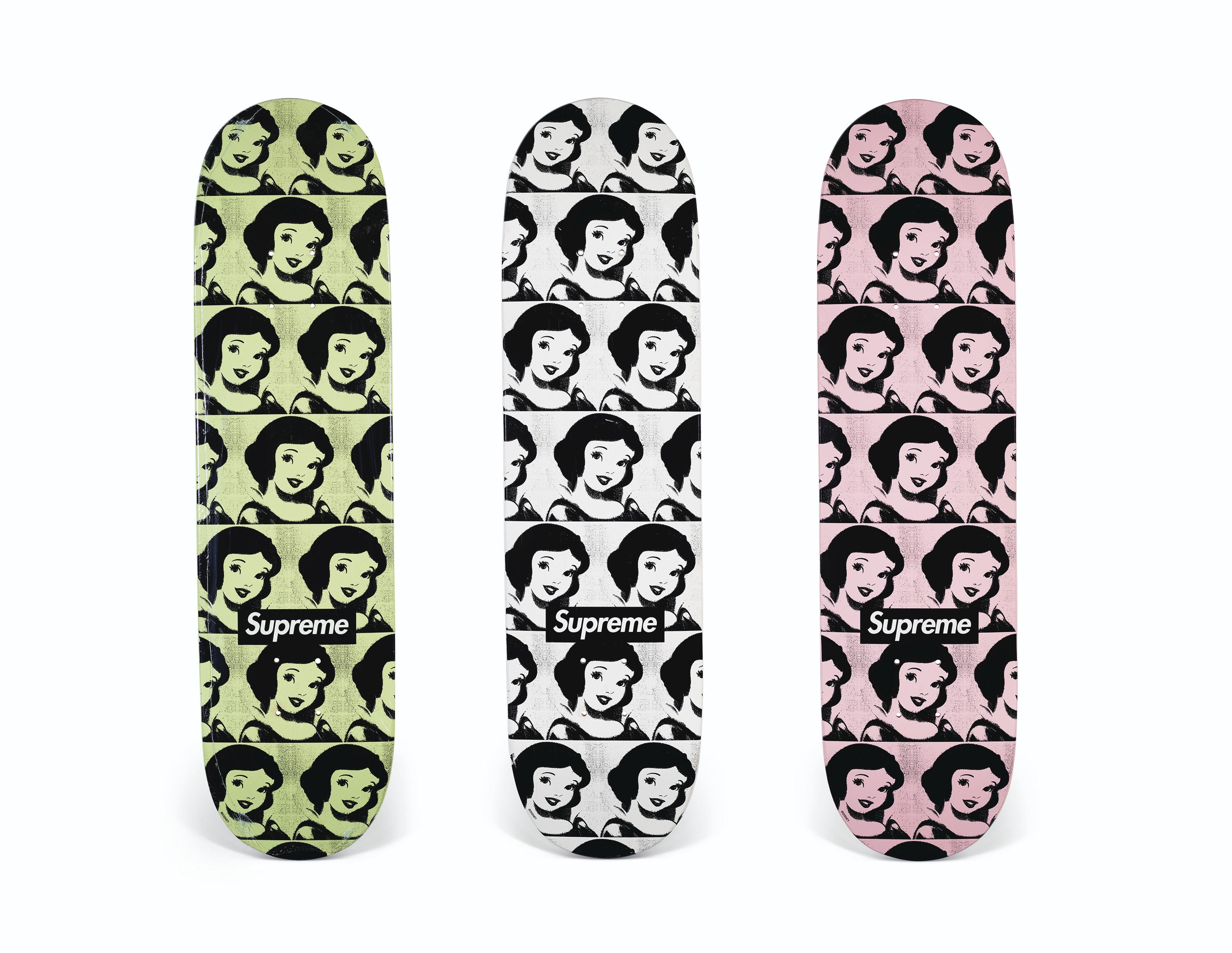 A SET OF THREE SNOW WHITE SKATEBOARDS