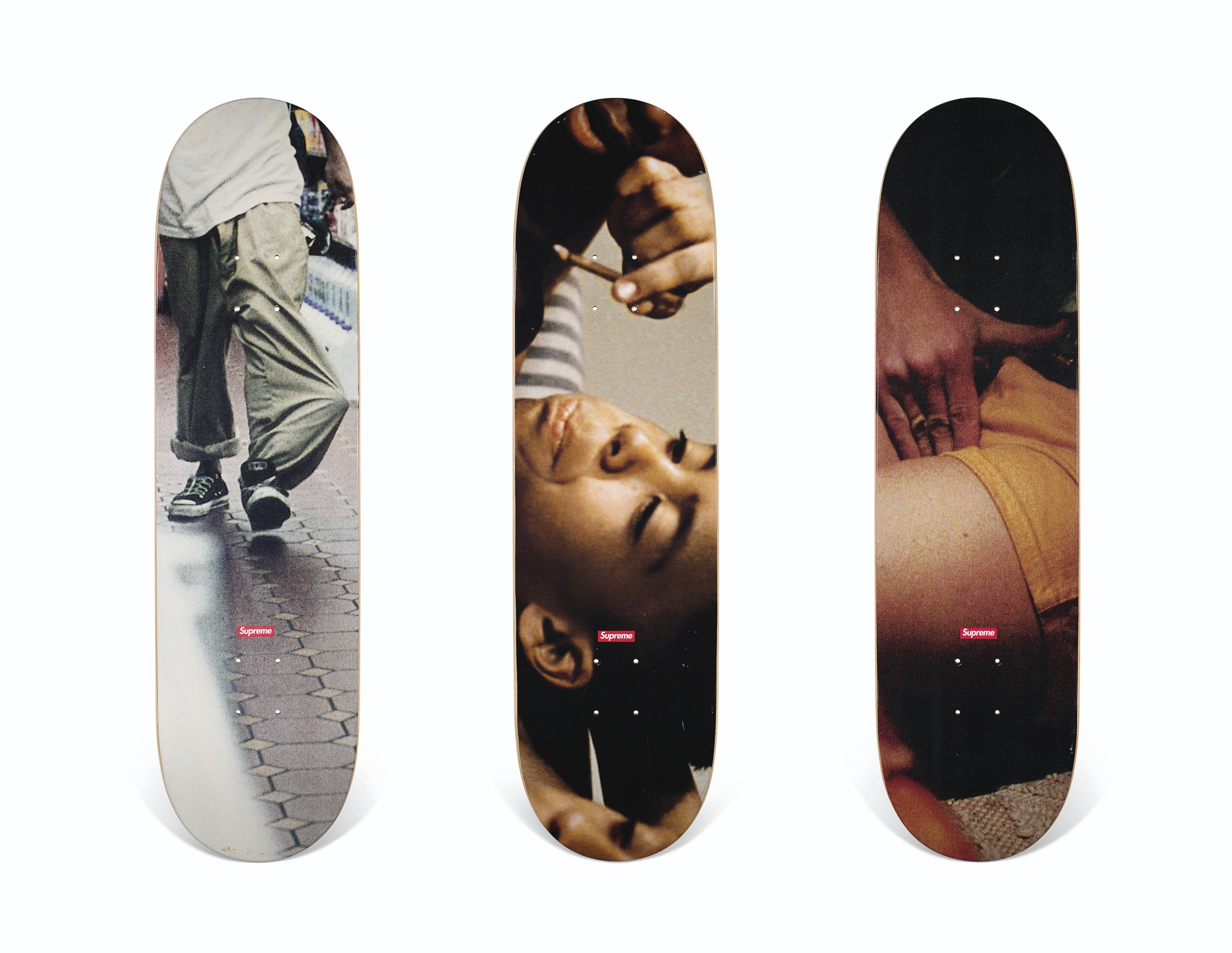 A SET OF THREE LARRY CLARK KIDS THE MOVIE SKATEBOARDS, SUPREME 
