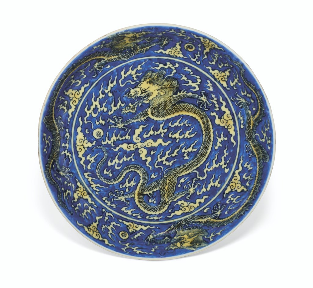 A YELLOW-ENAMELED BLUE-GROUND 'DRAGON' DISH