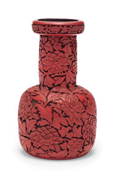 A rare and finely carved red lacquer mallet-form vase, China, Ming dynasty, 15th-16th century. 6¼  in (15.9  cm) high. Sold for $951,000 on 20 March 2019 at Christie’s in New York