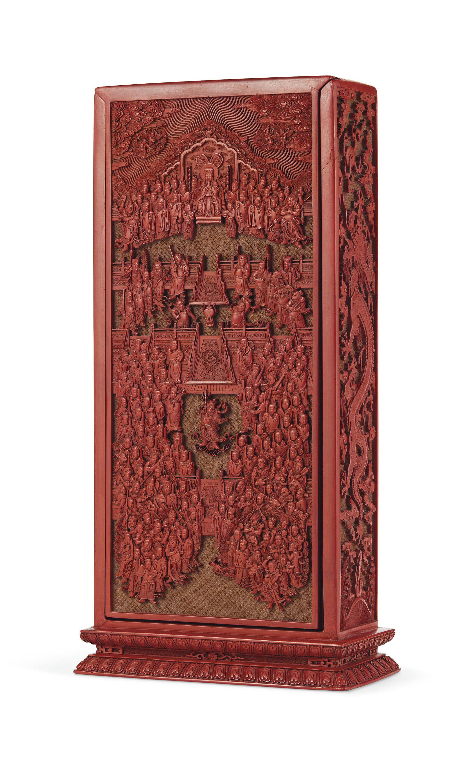 A rare and finely carved red lacquer Daoist scripture box and cover, China, Qing Dynasty, Qianlong period (1736-1795). 13&frac12;  in (33.9  cm) high. Sold for $1,035,000 on 20 March 2019 at Christie&rsquo;s in New York