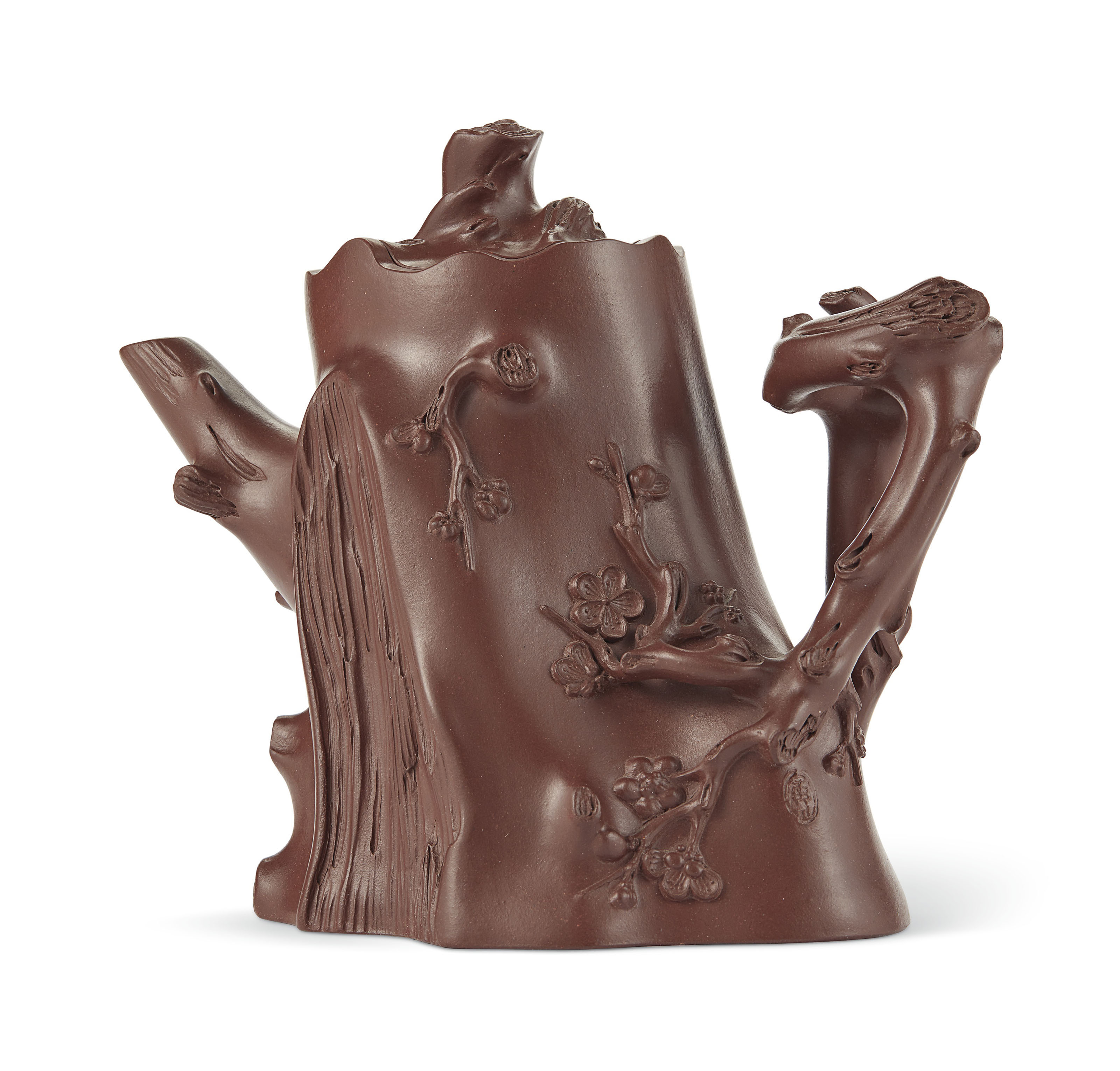 A Yixing &lsquo;Prunus&rsquo; tree trunk-form teapot and cover, Wang Yinxian (China, 1943-2018). 5&frac34;  in (14.6  cm) high. Estimate: $60,000-80,000. This lot is offered in Lacquer, Jade, Bronze, Ink: The Irving Collection Evening Sale on 20 March 2019 at Christie&rsquo;s in New York