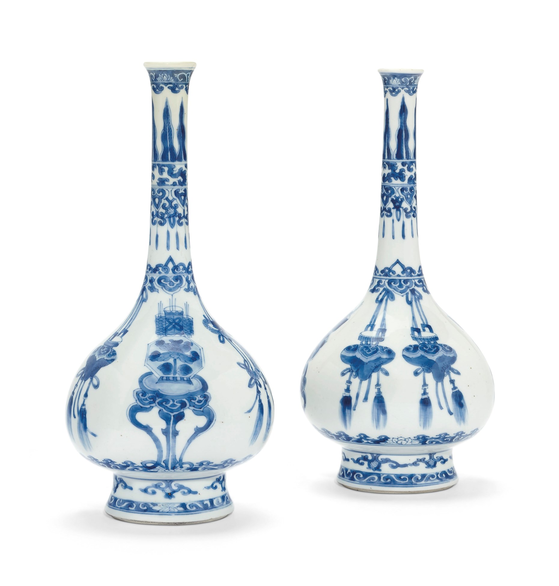 A PAIR OF BLUE AND WHITE BOTTLE VASES