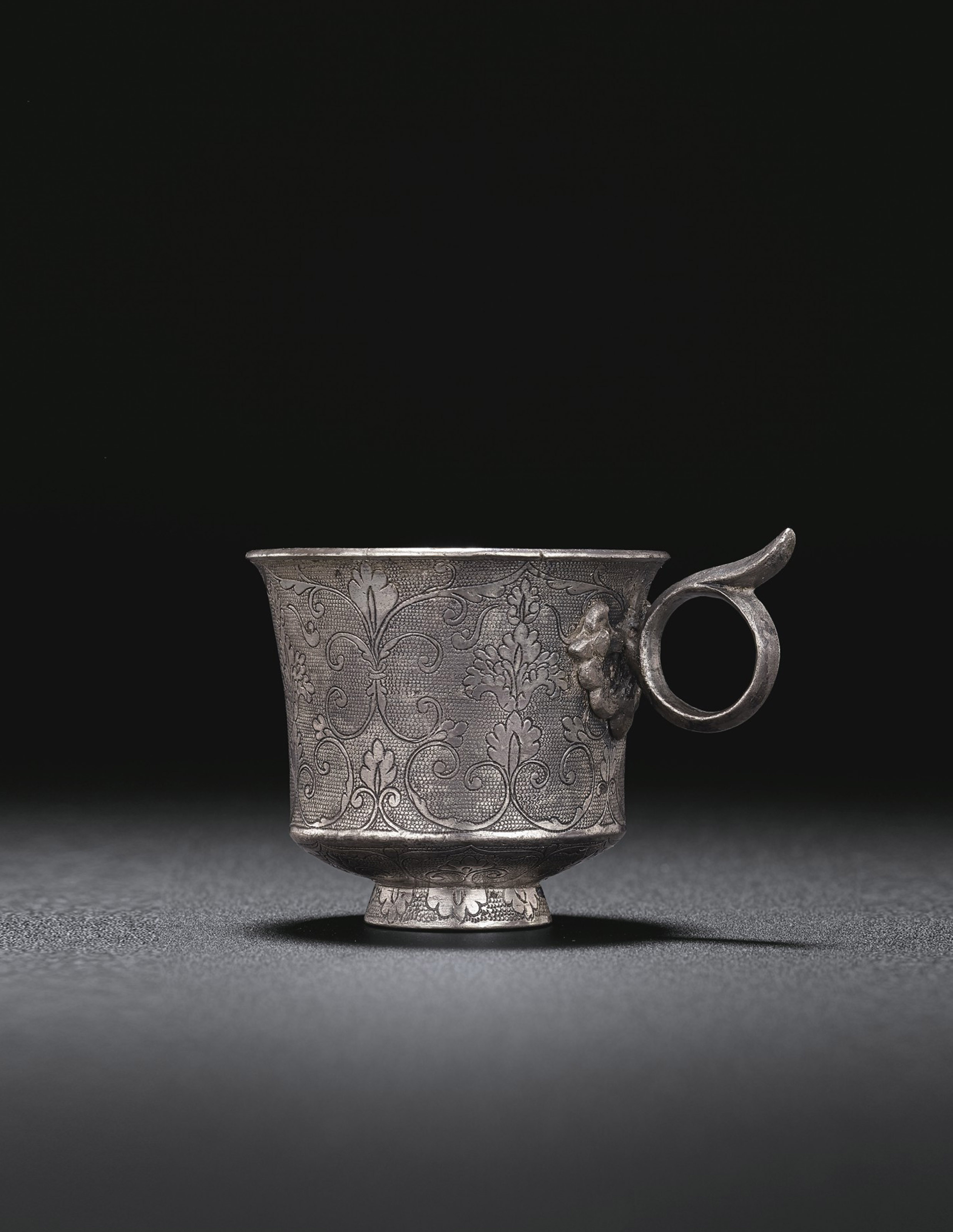 A FINELY ENGRAVED SMALL SILVER CUP , TANG DYNASTY (AD 618907) Christie's