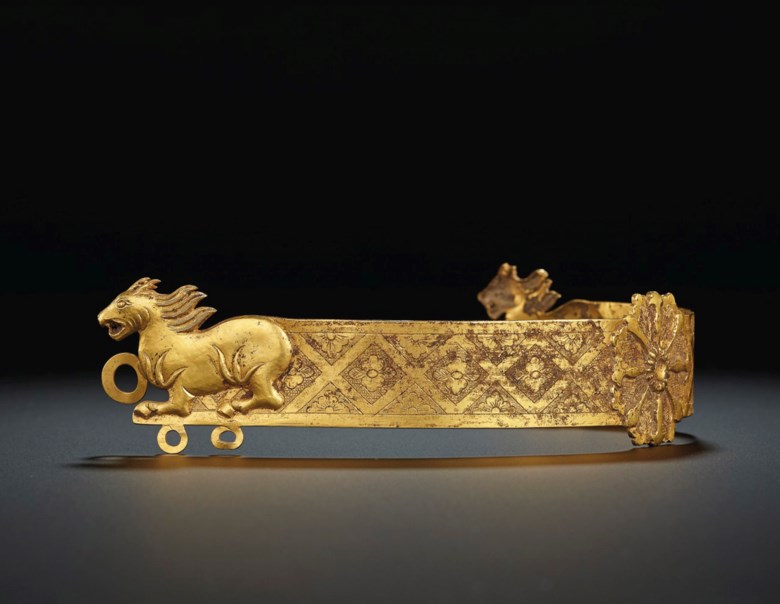 A very rare gold headdress, Tang dynasty, 7th-9th century AD. 12¼  in (31  cm) wide. Estimate $60,000-80,000. Offered in Masterpieces of Early Chinese Gold and Silver on 12 September 2019 at Christie’s in New York