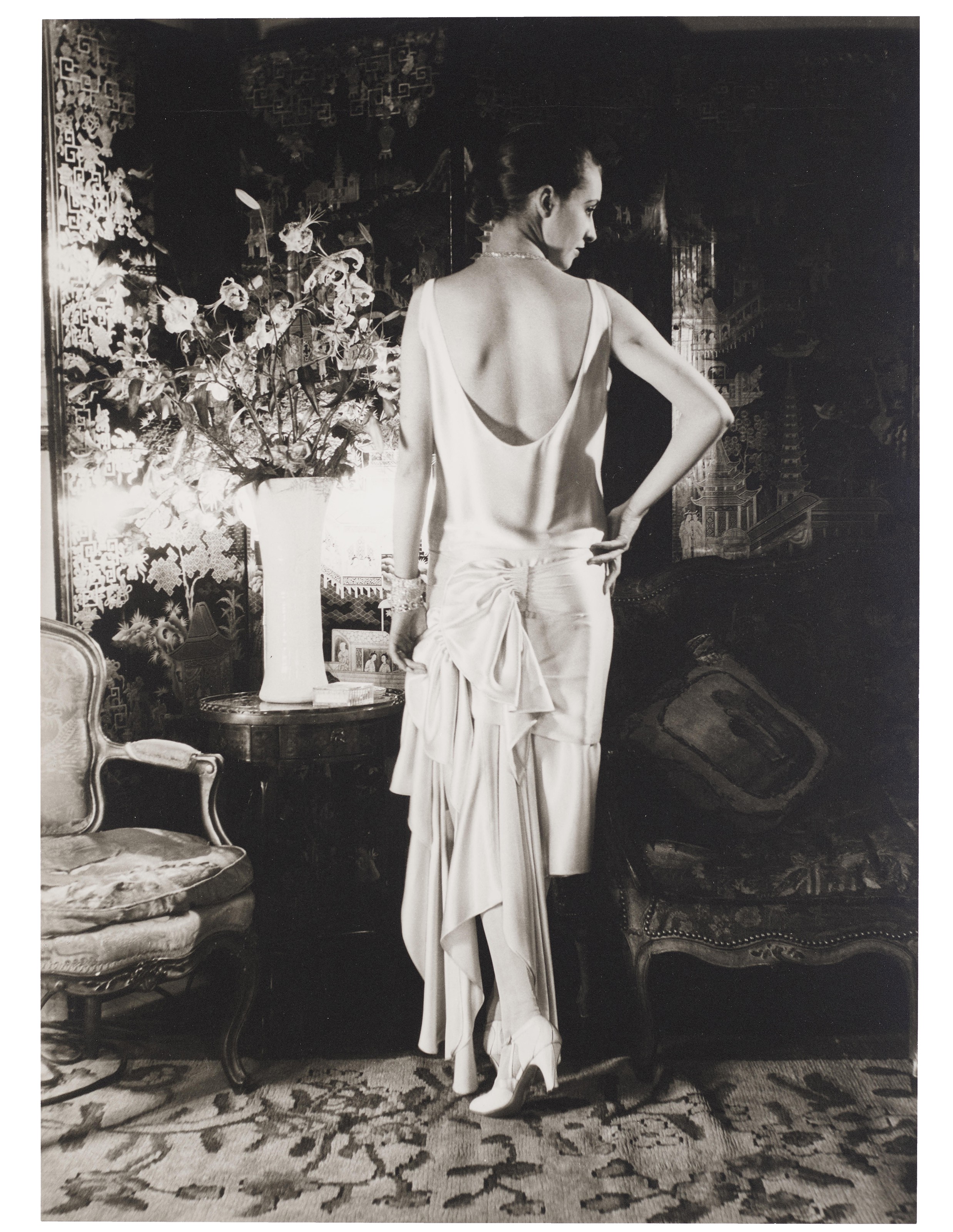 Cecil Beaton (1904-1980), Marion Moorehouse in Cond&eacute; Nast&rsquo;s New York Apartment, for Vogue, 1929. Gelatin silver print, mounted on board, printed early 1970s. Mount: 21⅞ x 16⅞ in (55.5 x 42.7 cm). Estimate: $3,000-5,000. Offered in 
Fashion Photo, 2-11 December 2019, Online