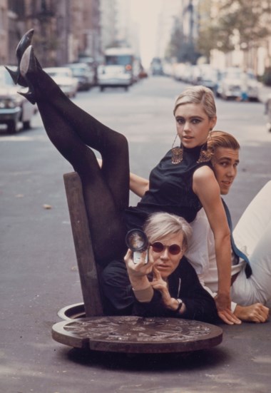 Burt Glinn (1925-2008), Andy Warhol with Edie Sedgwick and Chuck Wein, New York, 1965. Image 25.5 x 20.3  cm (10 x 8  in). Estimate €3,000-5,000. Offered in Icons of Glamour & Style The Constantiner Collection on 19 June 2019 at Christie’s in Paris