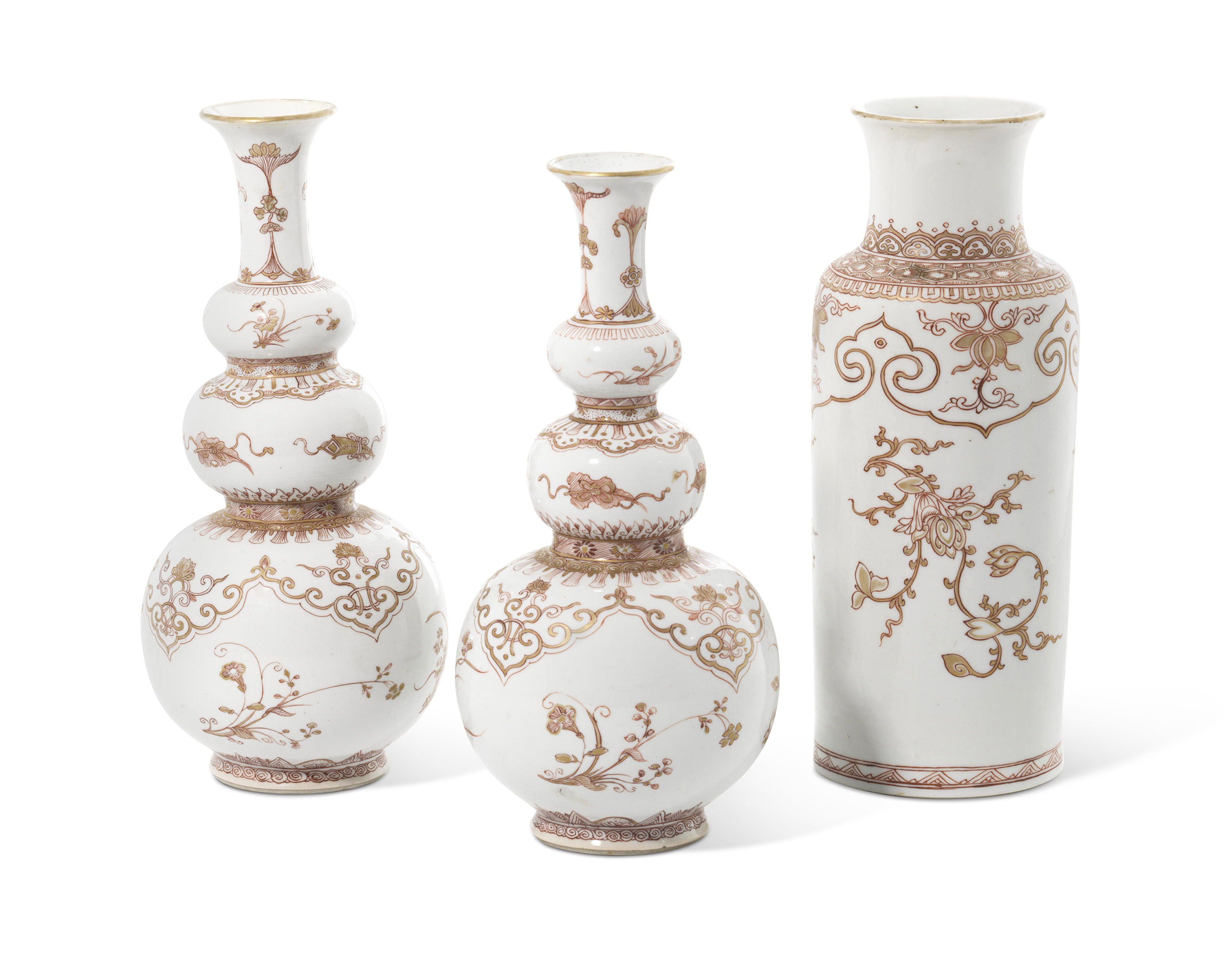 A GROUP OF THREE IRON-RED AND GILT-DECORATED VASES