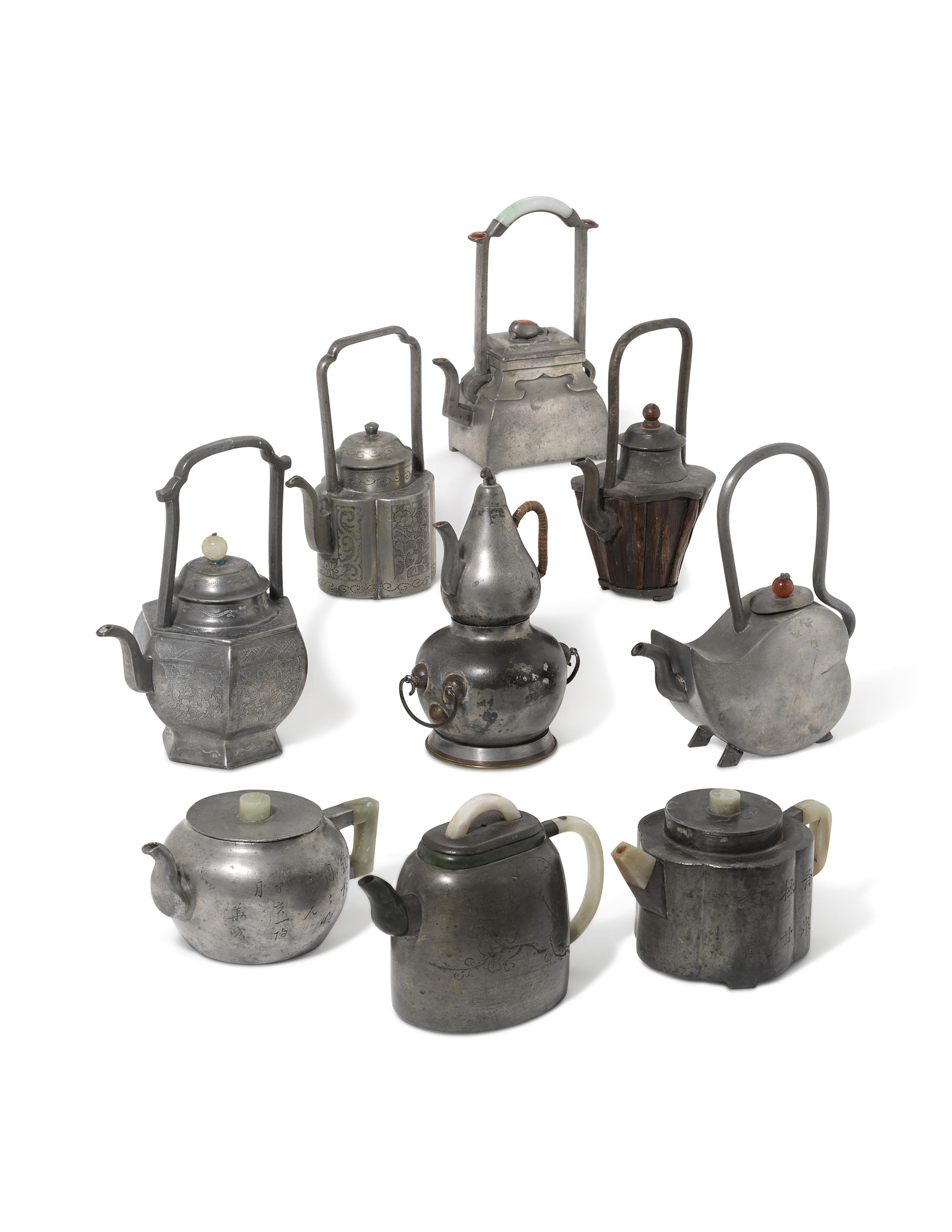 A GROUP OF NINE PEWTER TEAPOTS, 19TH CENTURY | Christie's
