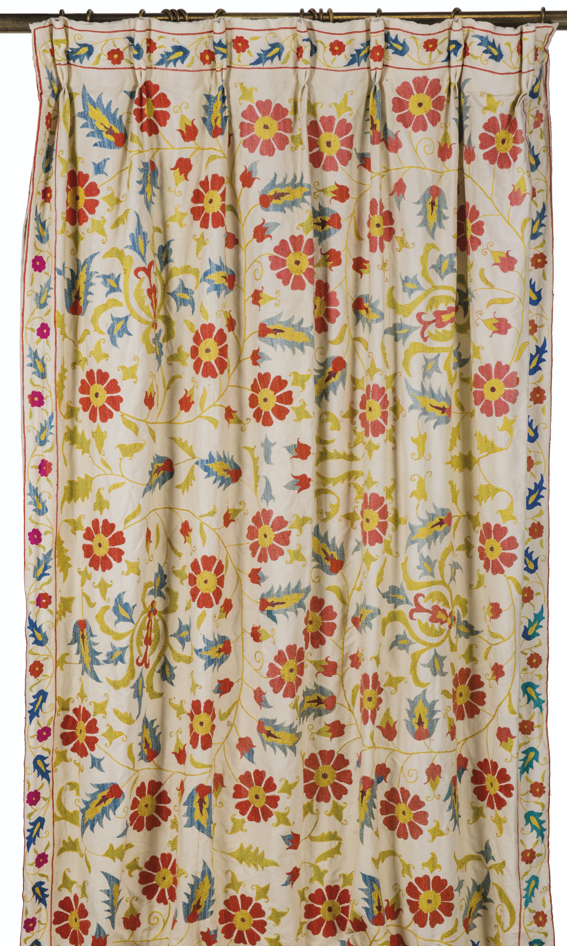 A GROUP OF HANDEMBROIDERED AND PRINTED CURTAINS , SUPPLIED BY ROBERT