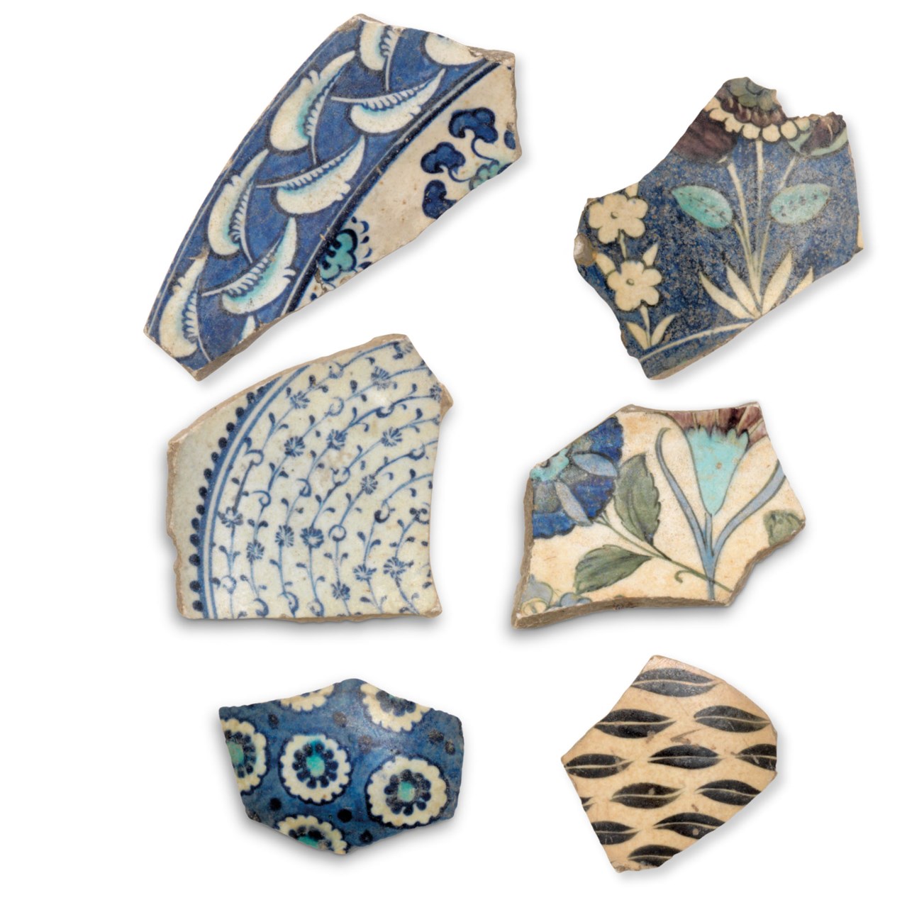A GROUP OF SIX IZNIK POTTERY FRAGMENTS