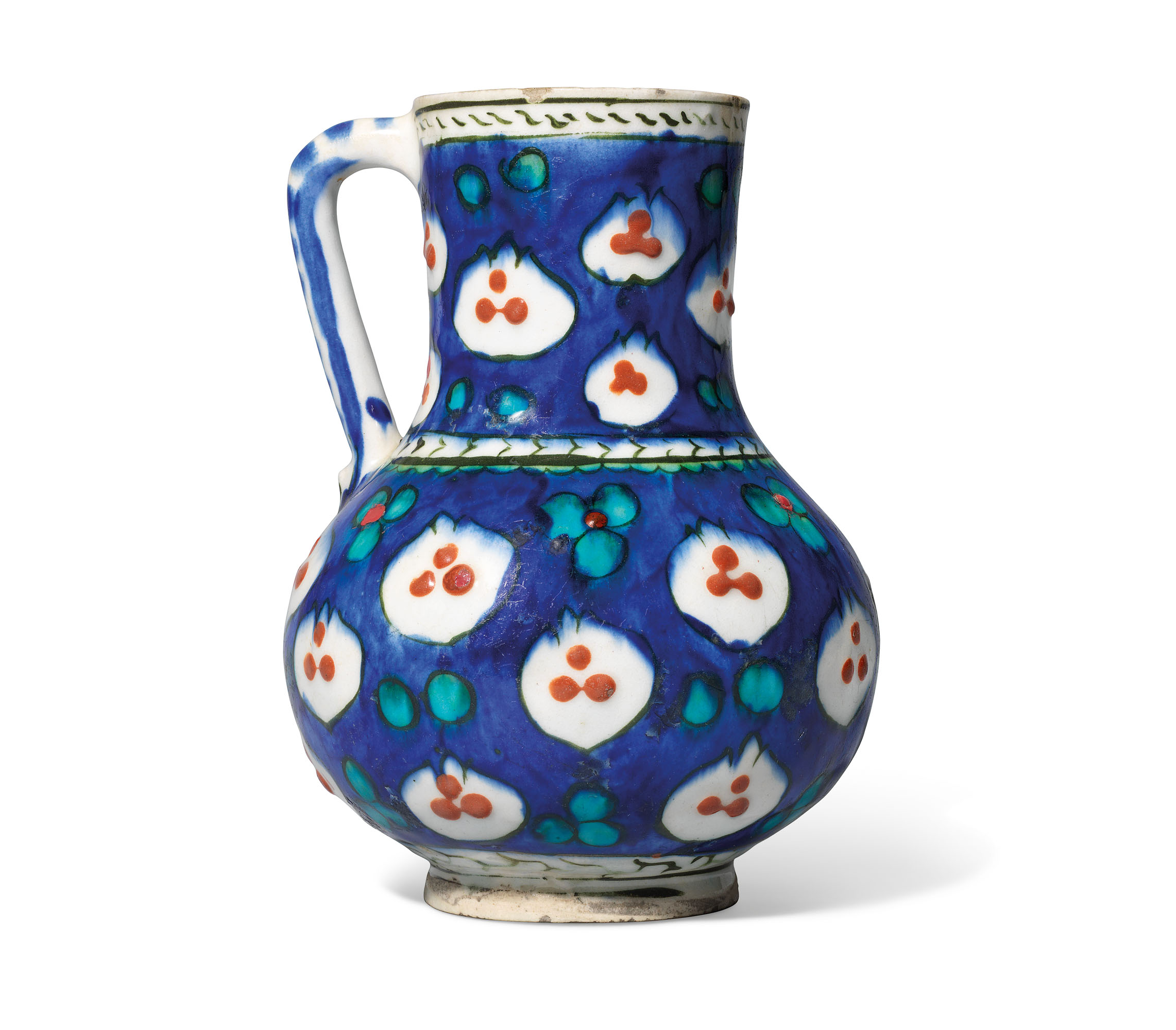 AN IZNIK POTTERY JUG , OTTOMAN TURKEY, CIRCA 1570 | Christie’s