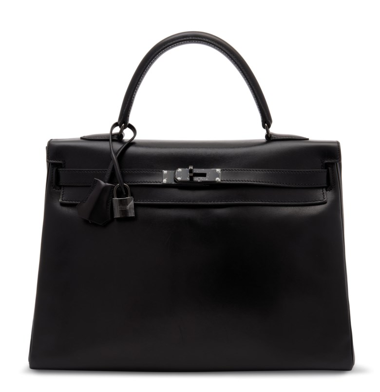 A limited edition black calf box leather retourné So Black Kelly 35 with black PVD hardware, Hermès, 2011. 35 w x 25 h x 13 d cm. Sold for £16,250 in Handbags & Accessories on 31 July 2020 at Christie’s in London