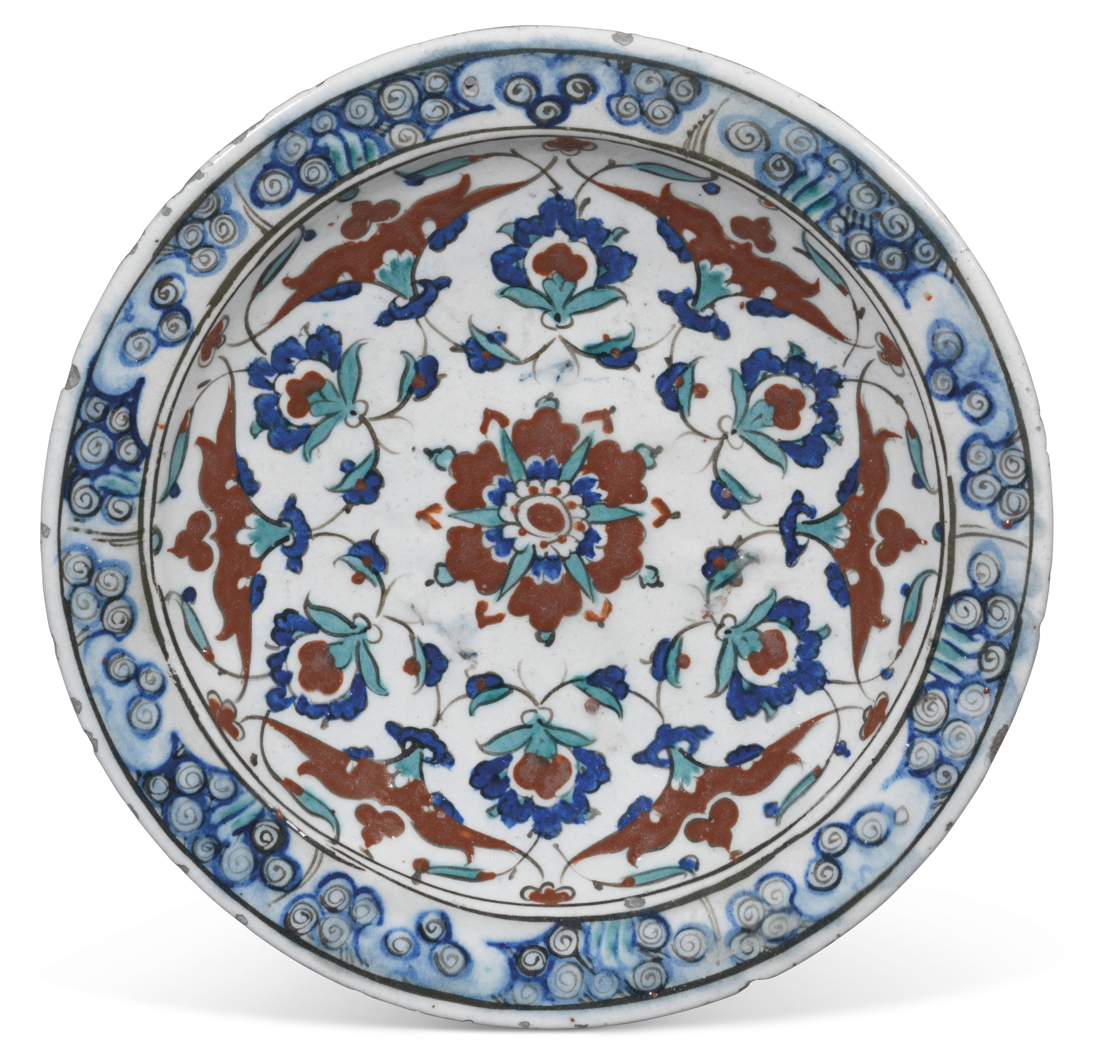 AN IZNIK POTTERY DISH , OTTOMAN TURKEY, CIRCA 1600 Christie's