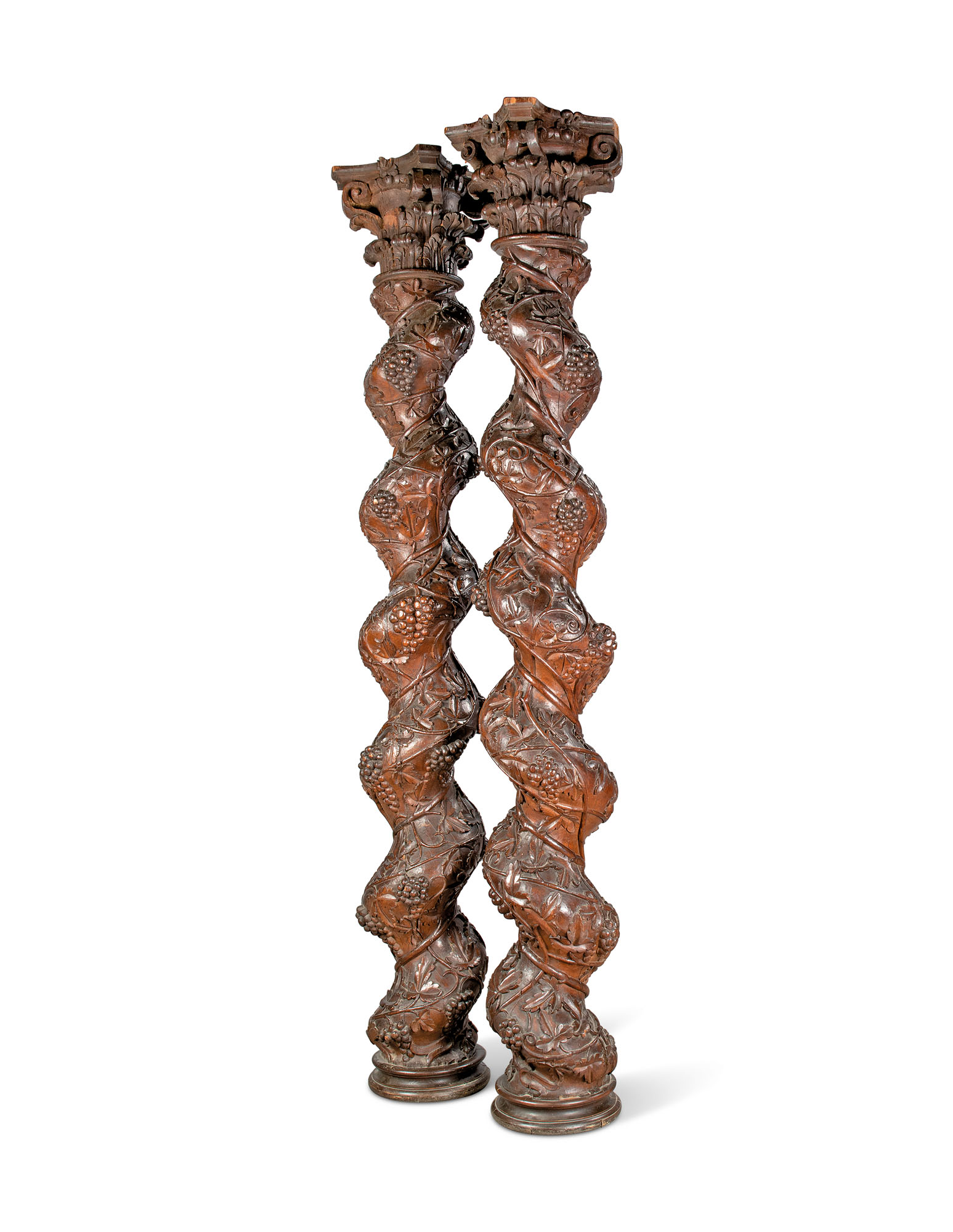 A PAIR OF SPANISH CARVED WALNUT SOLOMONIC COLUMNS, 19TH/20TH CENTURY ...
