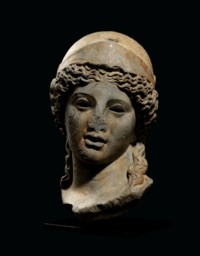A MONUMENTAL ROMAN GREY MARBLE HEAD OF MINERVA