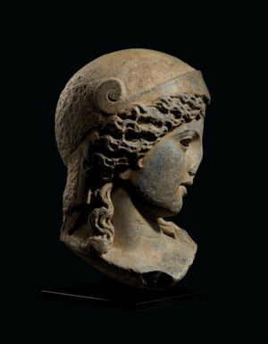A MONUMENTAL ROMAN GREY MARBLE HEAD OF MINERVA