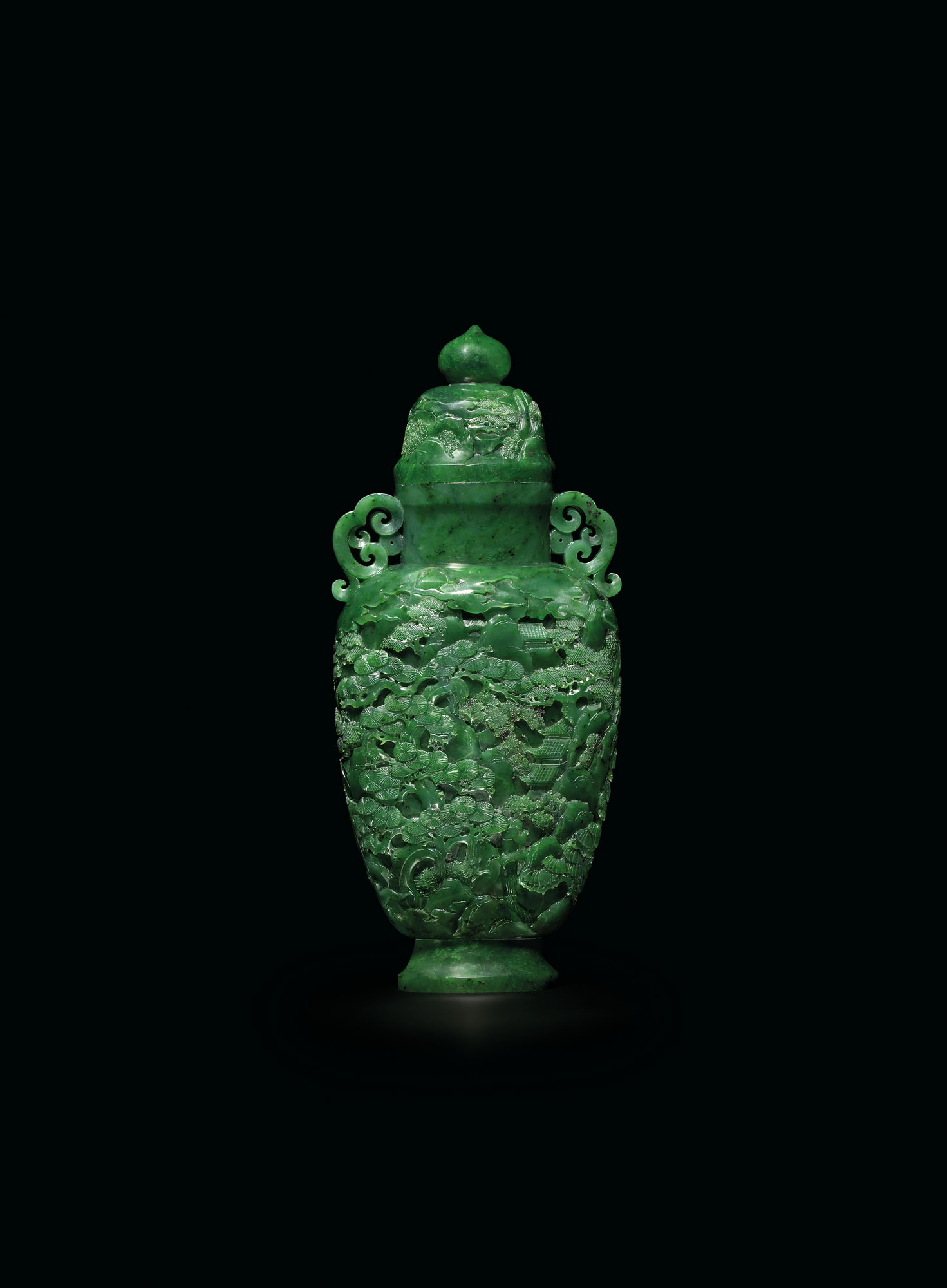 A FINELY CARVED SPINACHGREEN JADE 'LANDSCAPE' VASE AND COVER , 18TH
