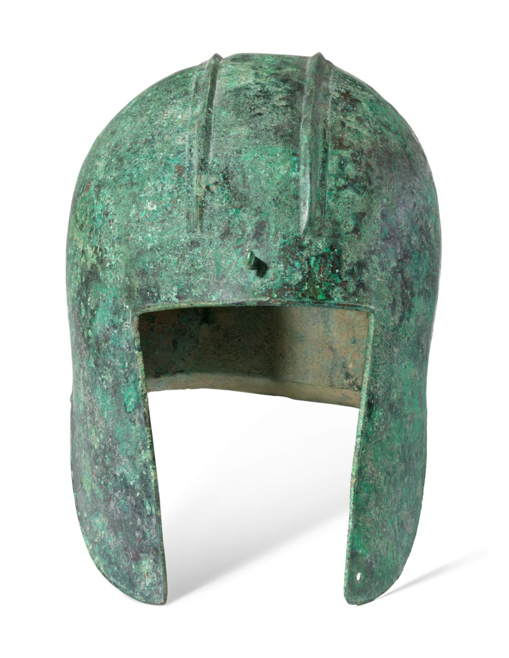 AN ILLYRIAN BRONZE HELMET, ARCHAIC PERIOD, CIRCA 6TH CENTURY B.C