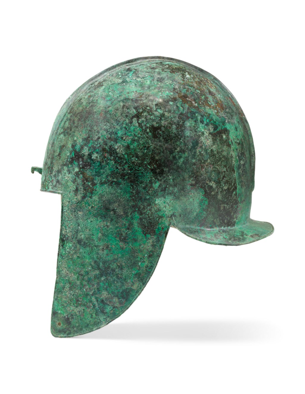 AN ILLYRIAN BRONZE HELMET, ARCHAIC PERIOD, CIRCA 6TH CENTURY B.C