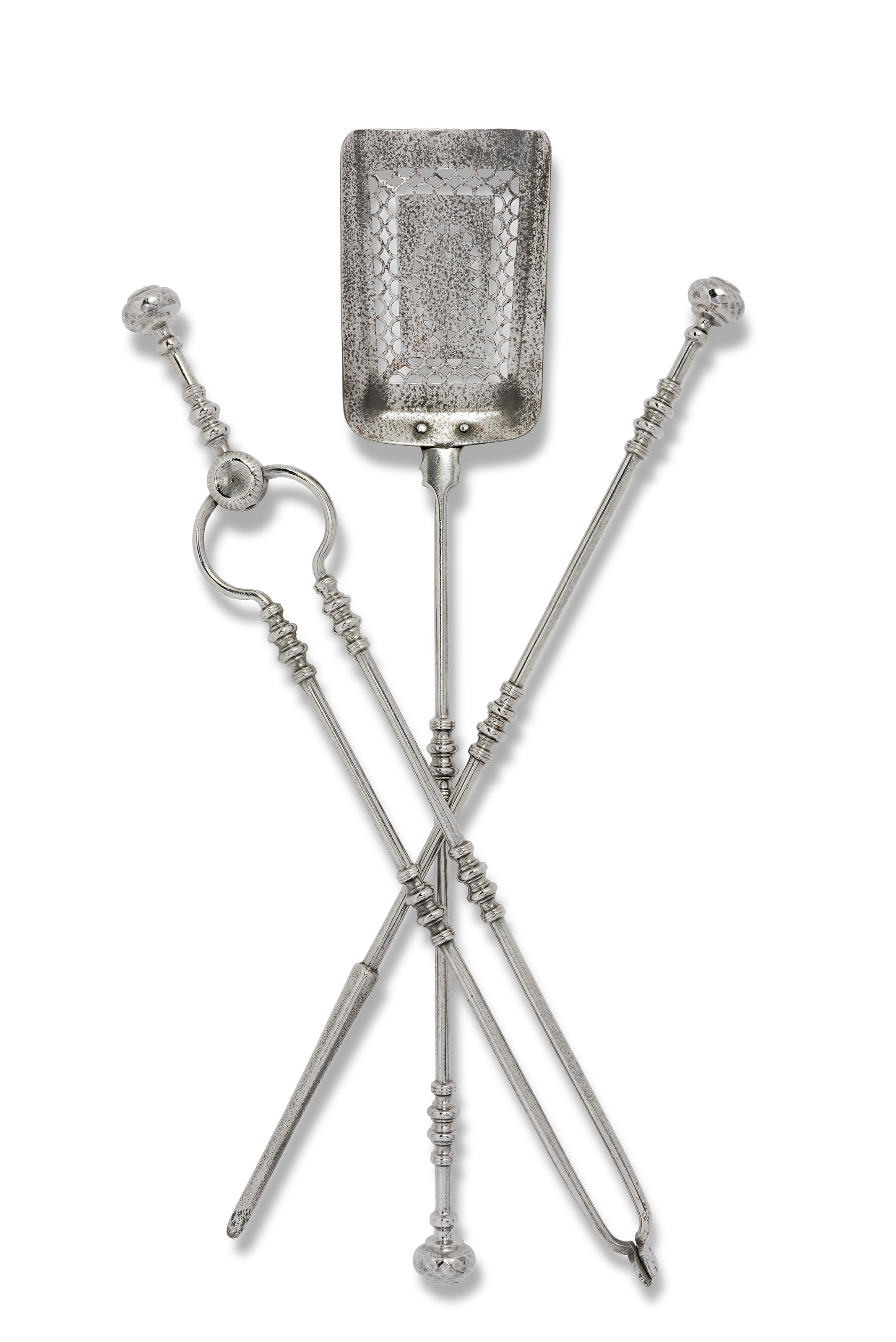 A REGENCY SET OF STEEL FIREIRONS, 19TH CENTURY Christie’s