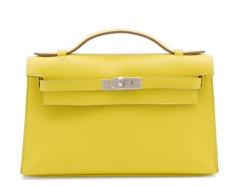 A lime swift leather Kelly pochette with palladium hardware, Hermès, 2019. 22 w x 13 h x 6 d cm. Estimate £4,000-6,000. Offered in Handbags Online The London Edition, 9-25 June 2020, Online