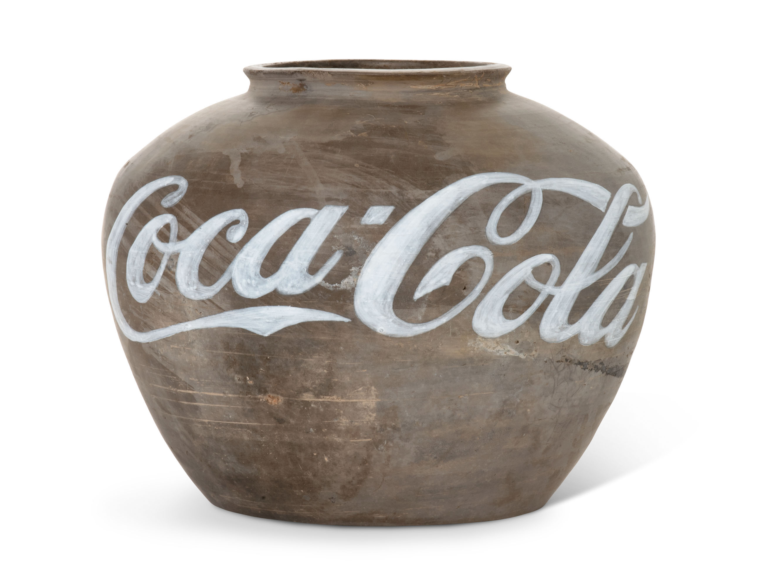 Ai Weiwei (b. 1957), Coca-Cola Vase, 2009. Han dynasty vase and industrial paint. 10⅛&nbsp;x 12⅞ x 12⅞&nbsp;in (25.7 x 32 x 32 cm). Estimate: &pound;250,000-350,000. Offered in 
The World Is A Sphere: Art from the Faurschou Foundation, 3-16 July 2020, Online