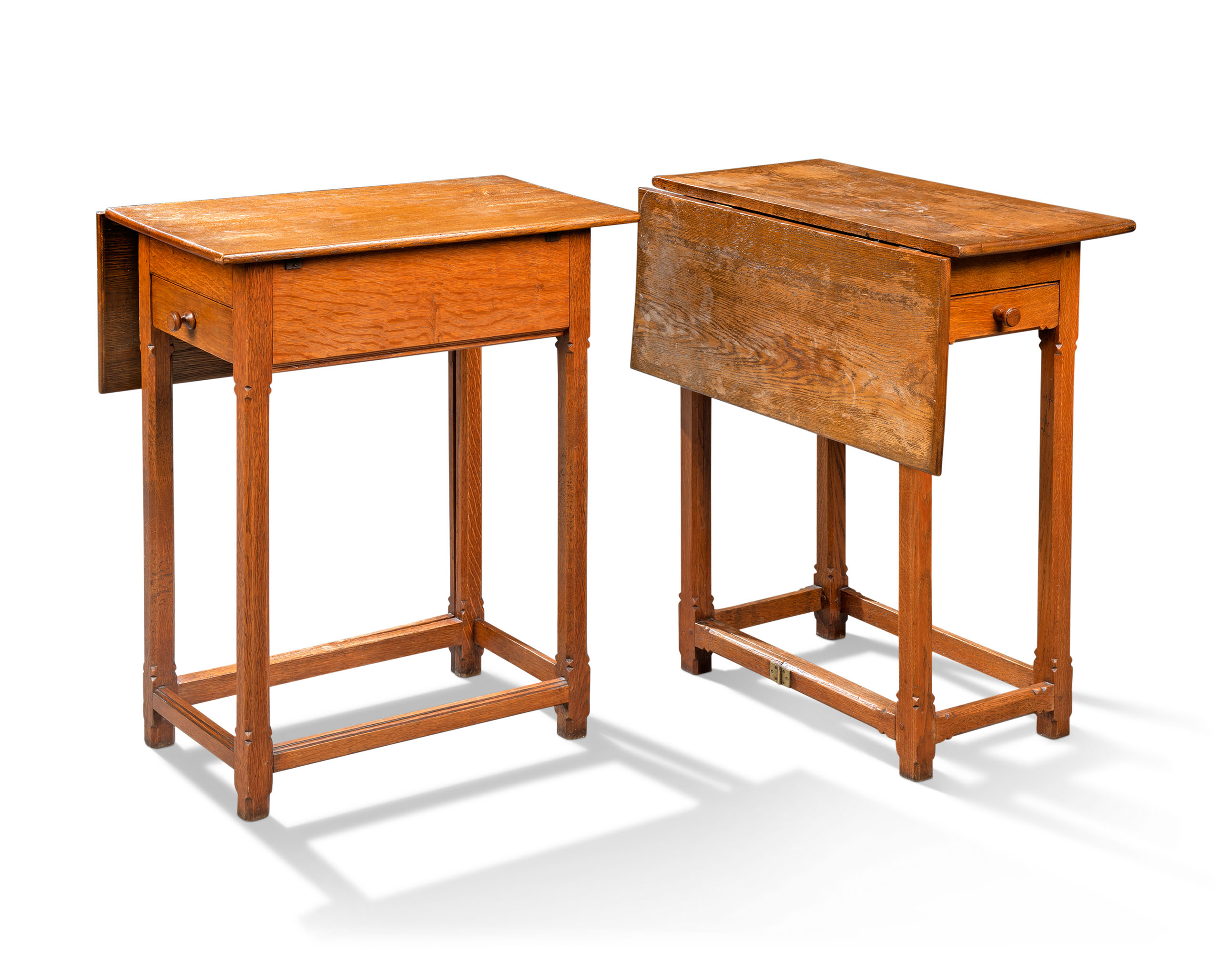 A PAIR OF ARTS AND CRAFTS OAK BEDSIDE TABLES, DATED 1913 Christie’s