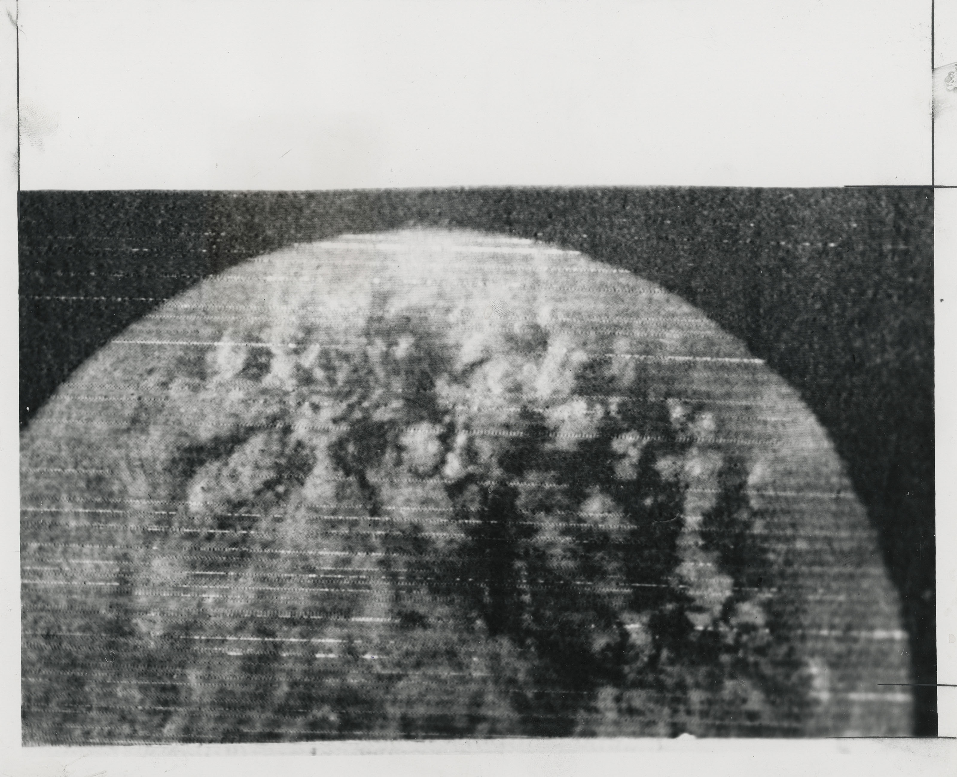First man-made images from space; Titov taking the first motion