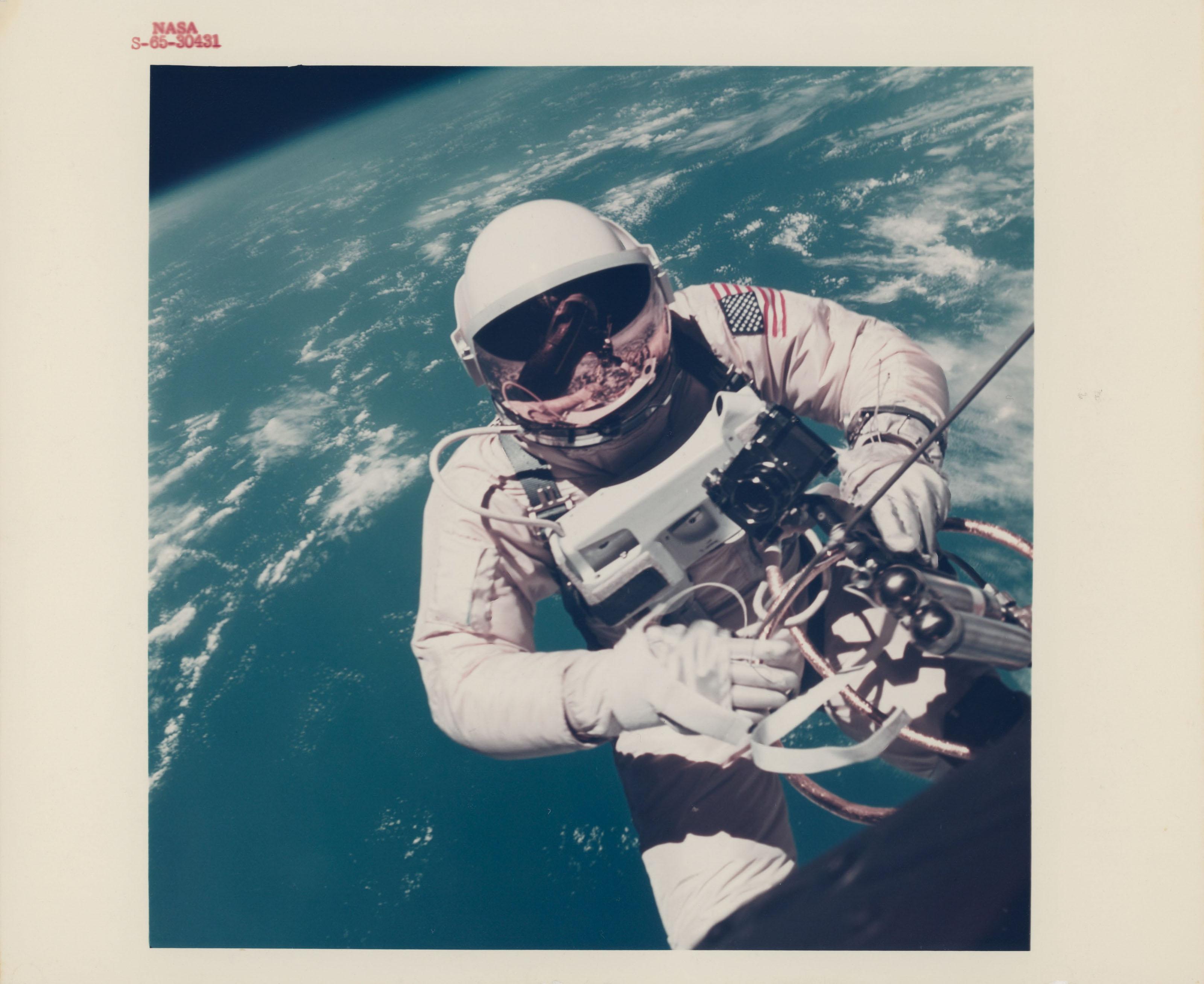 The historic first photograph of man in space Ed White spacewalking