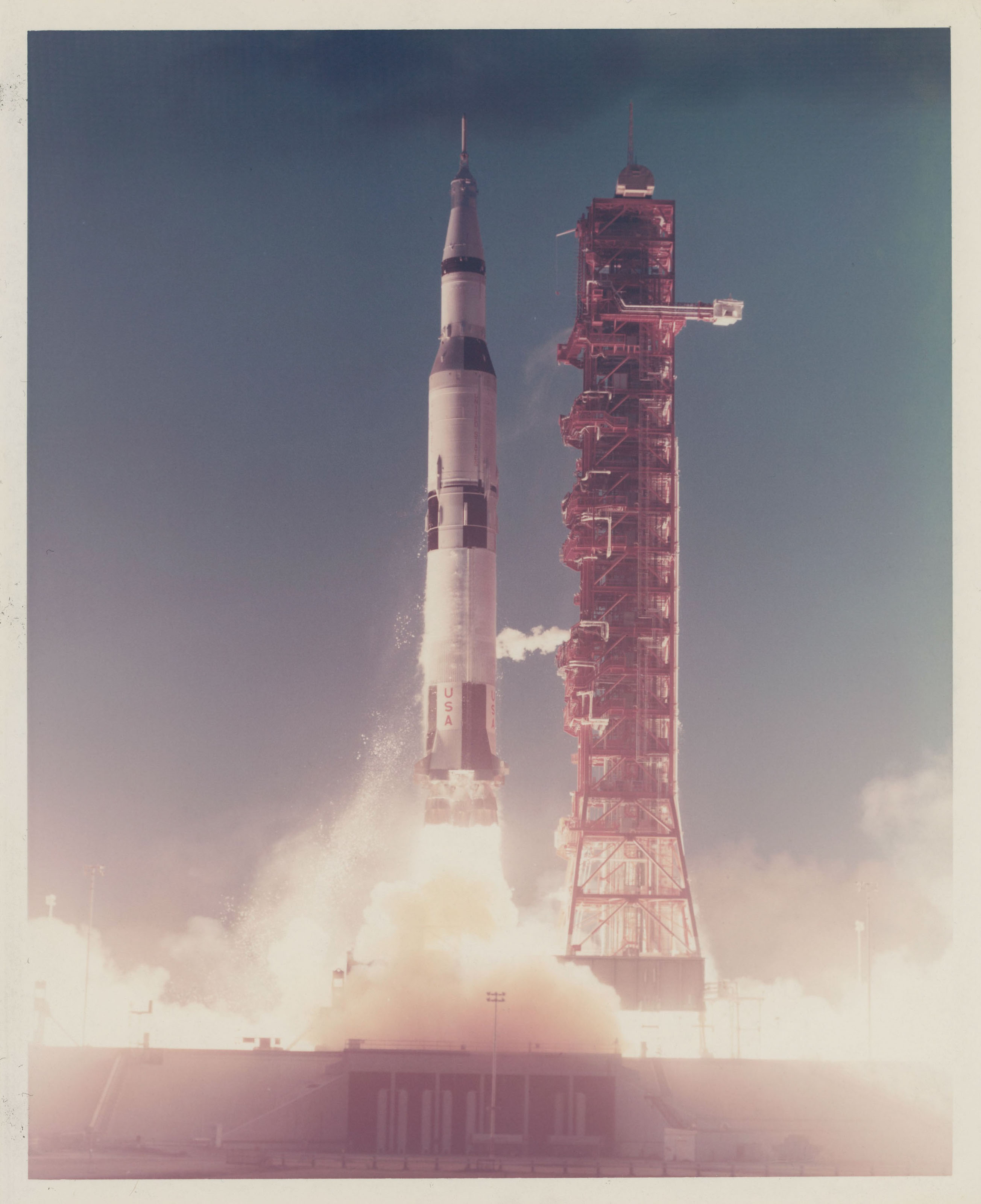 The first Saturn V rocket lifting off from Pad 39A; wideangle view of